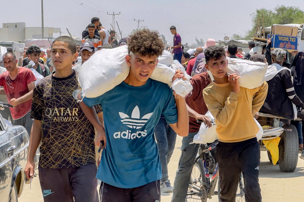 Israel recently was forced to allow some aid deliveries to resume to enter Gaza after barring them for more than two months (AFP)