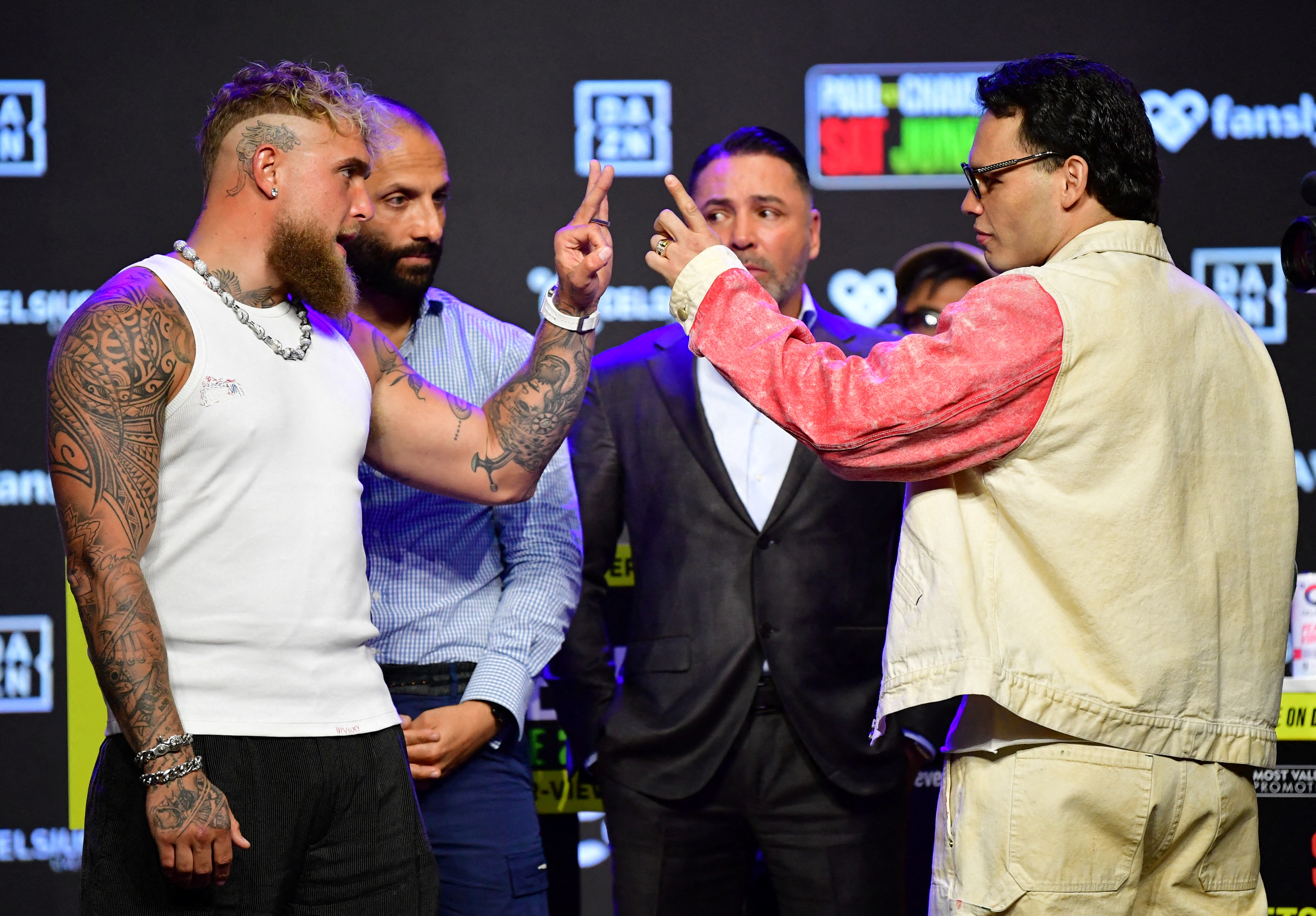 Jake Paul and Julio Cesar Chavez Jr react.