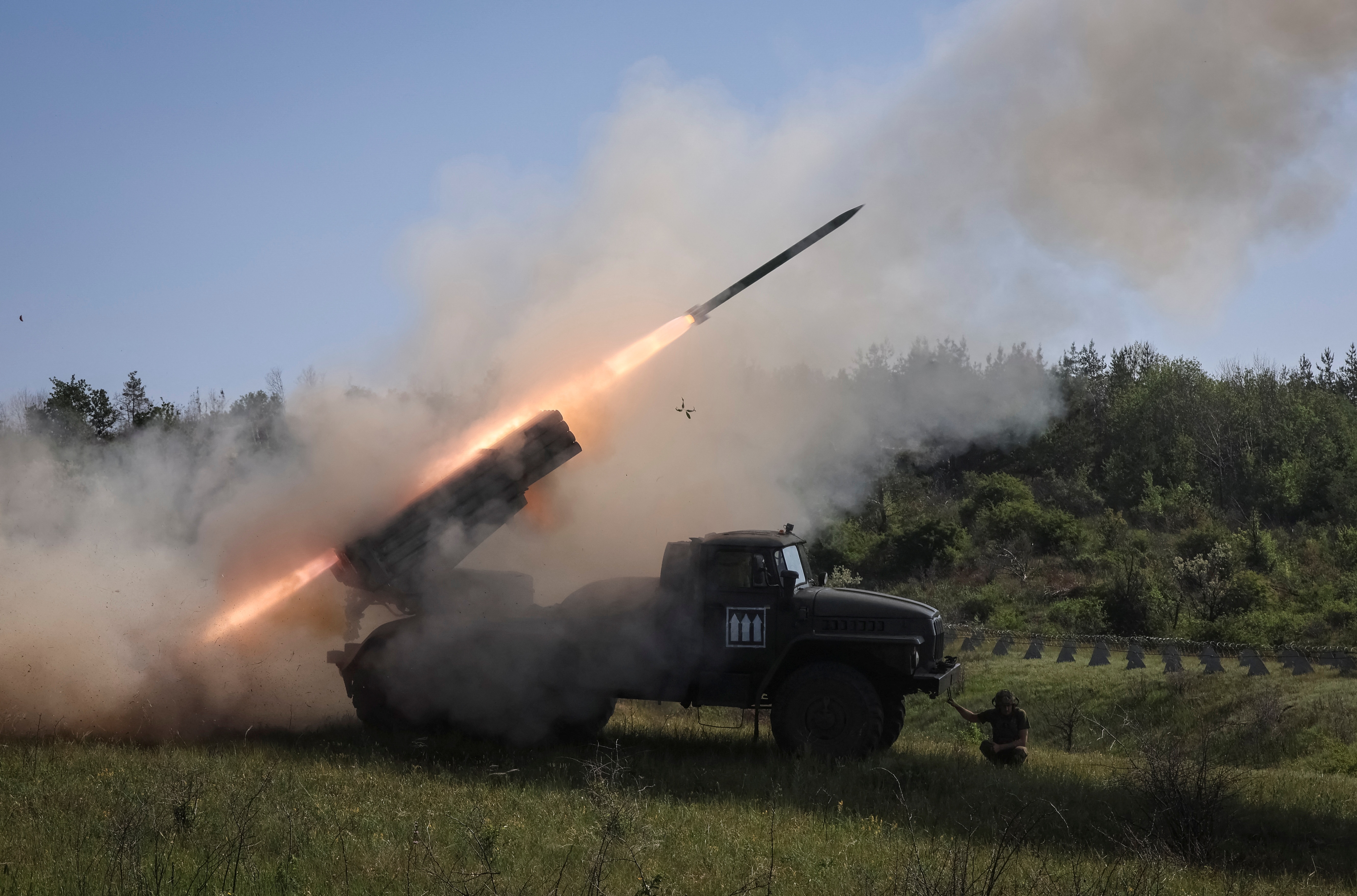 Ukrainian servicemen of the 30th Prince Kostiantyn Ostrozkyi Separate Mechanized Brigade prepare to fire a BM-21 Grad multiple rocket launch system towards Russian troops on June 3, 2025 [Vyacheslav Madiyevskyy/Reuters]