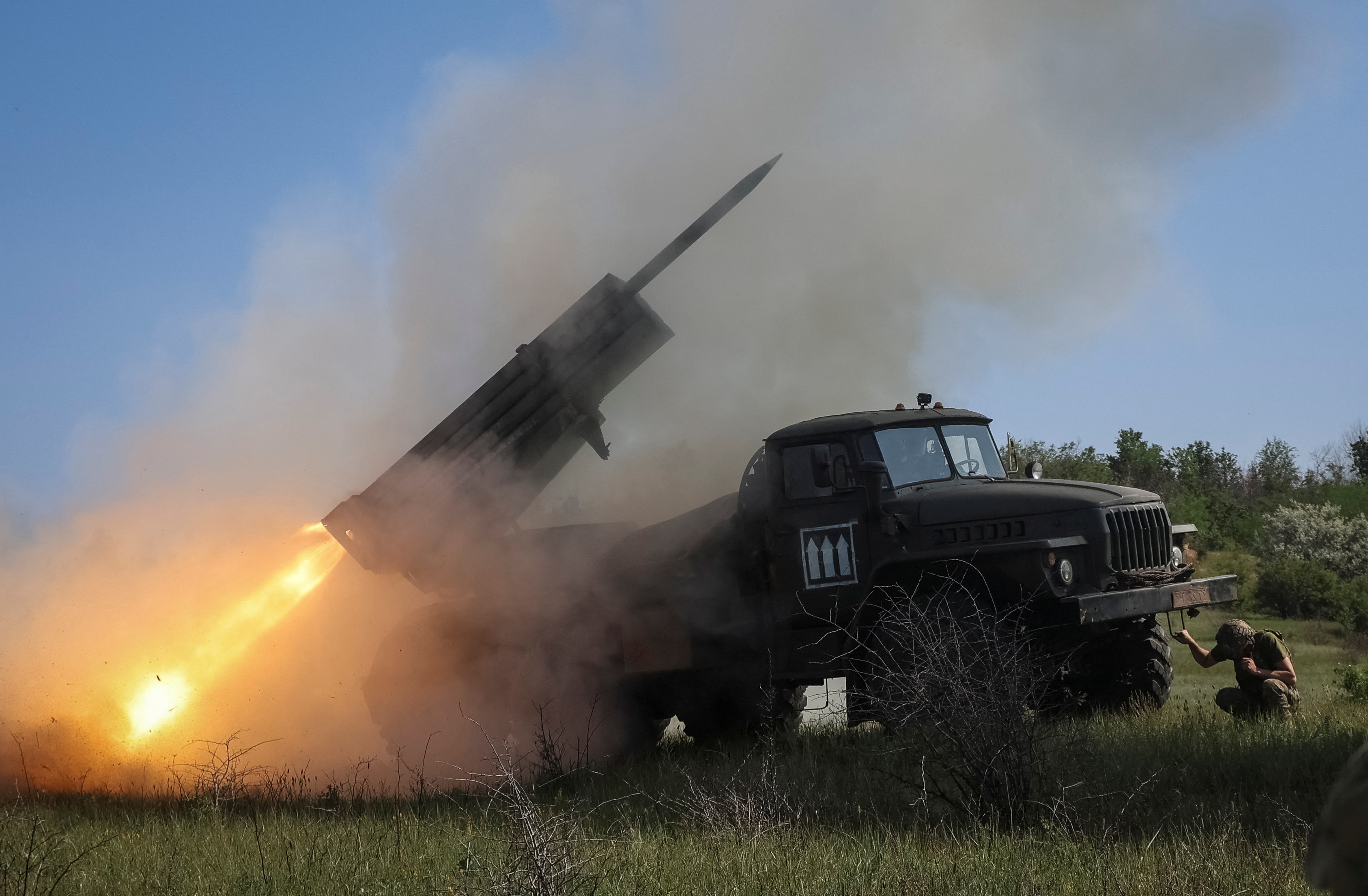 Ukrainian servicemen of the 30th Prince Kostiantyn Ostrozkyi Separate Mechanized Brigade of the Ukrainian Armed Forces fire a BM-21 Grad multiple rocket launch system towards Russian troops, amid Russia's attack on Ukraine, in Donetsk region, Ukraine June 3, 2025. REUTERS/Vyacheslav Madiyevskyy TPX IMAGES OF THE DAY