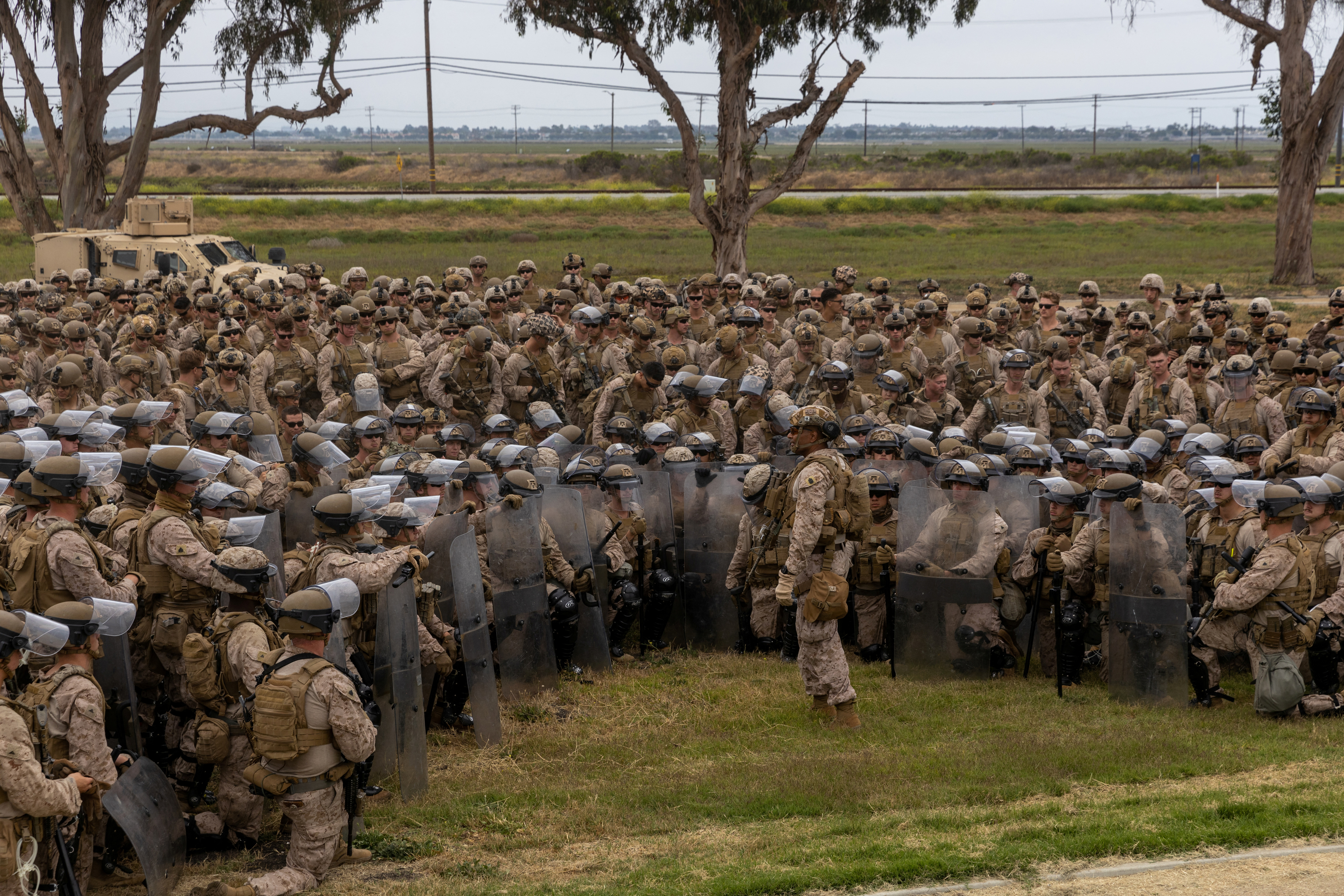 U.S. Marines with 2nd Battalion, 7th Marine Regiment, 1st Marine Division, who were placed in an alert status over the weekend, are briefed by battalion leadership while rehearsing crowd control tactics at a base in the greater Los Angeles area, California, U.S. June 10, 2025. U.S. Marine Corps/Cpl. Logan Courtright/Handout via REUTERS THIS IMAGE HAS BEEN SUPPLIED BY A THIRD PARTY