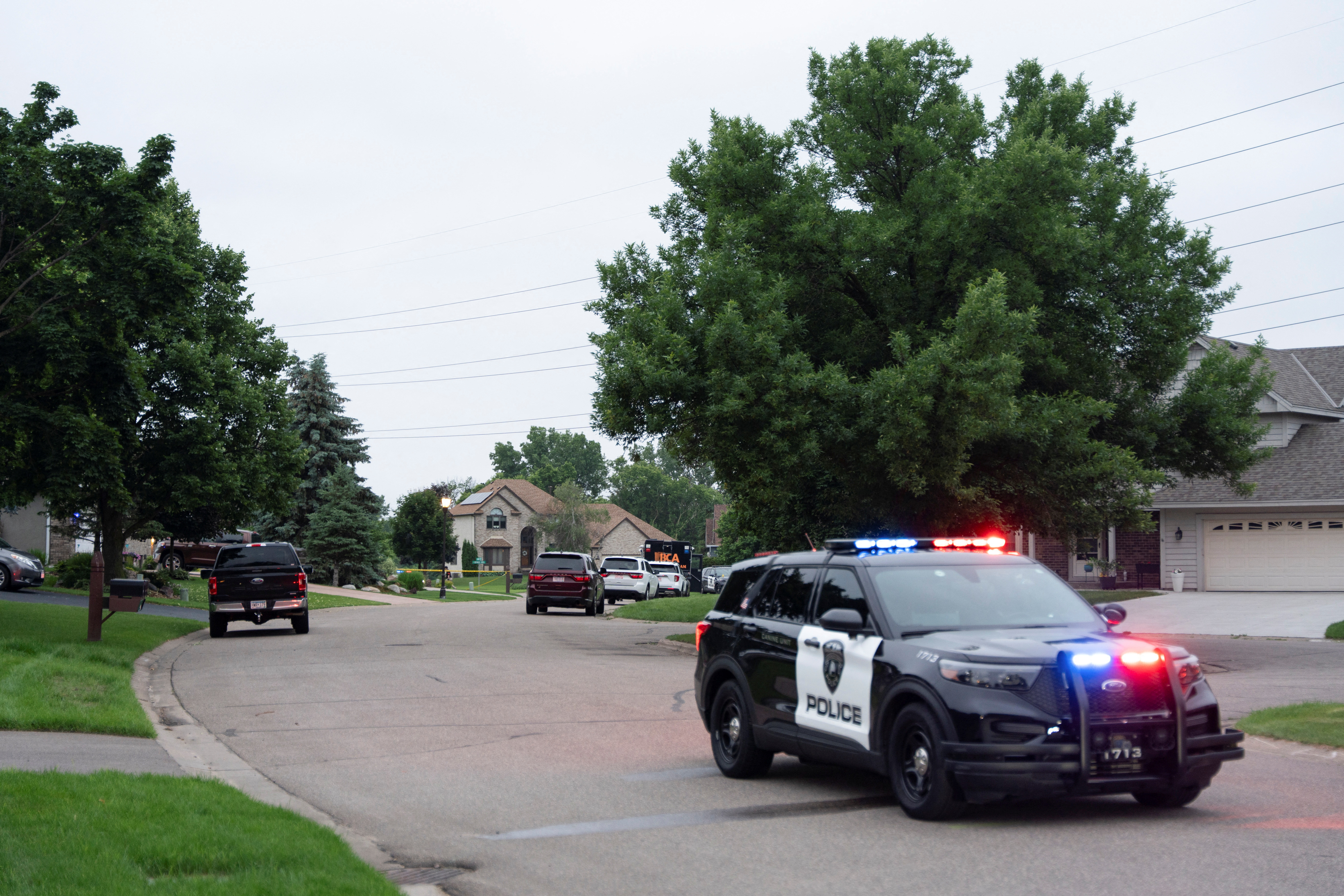 Law enforcement establish a security perimeter near the residence of senior Democratic state assemblywoman Melissa Hortman after Hortman and her husband, Marc, were shot in Brooklyn Park, Minnesota, US
