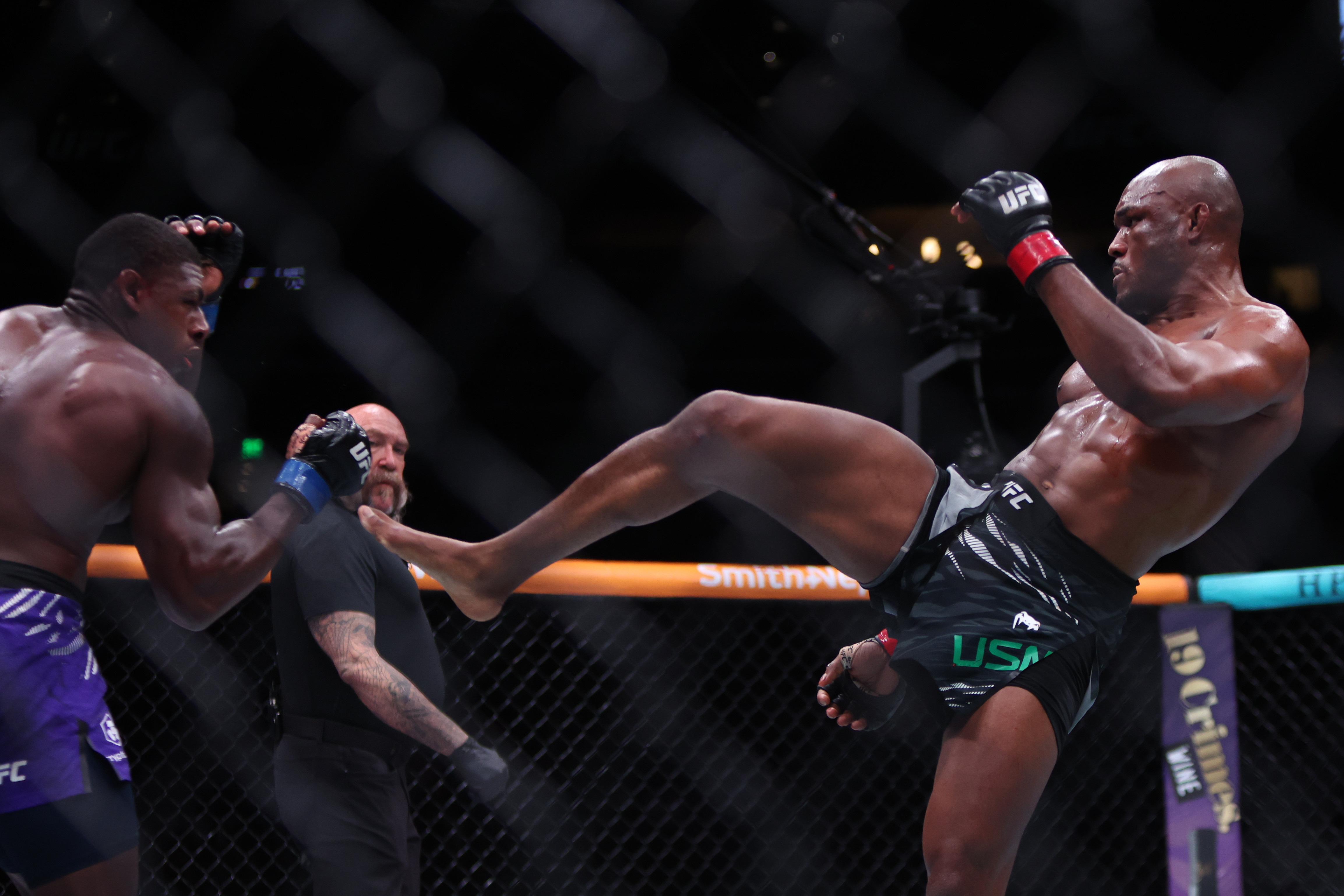 Kamaru Usman and Joaquin Buckley in action.