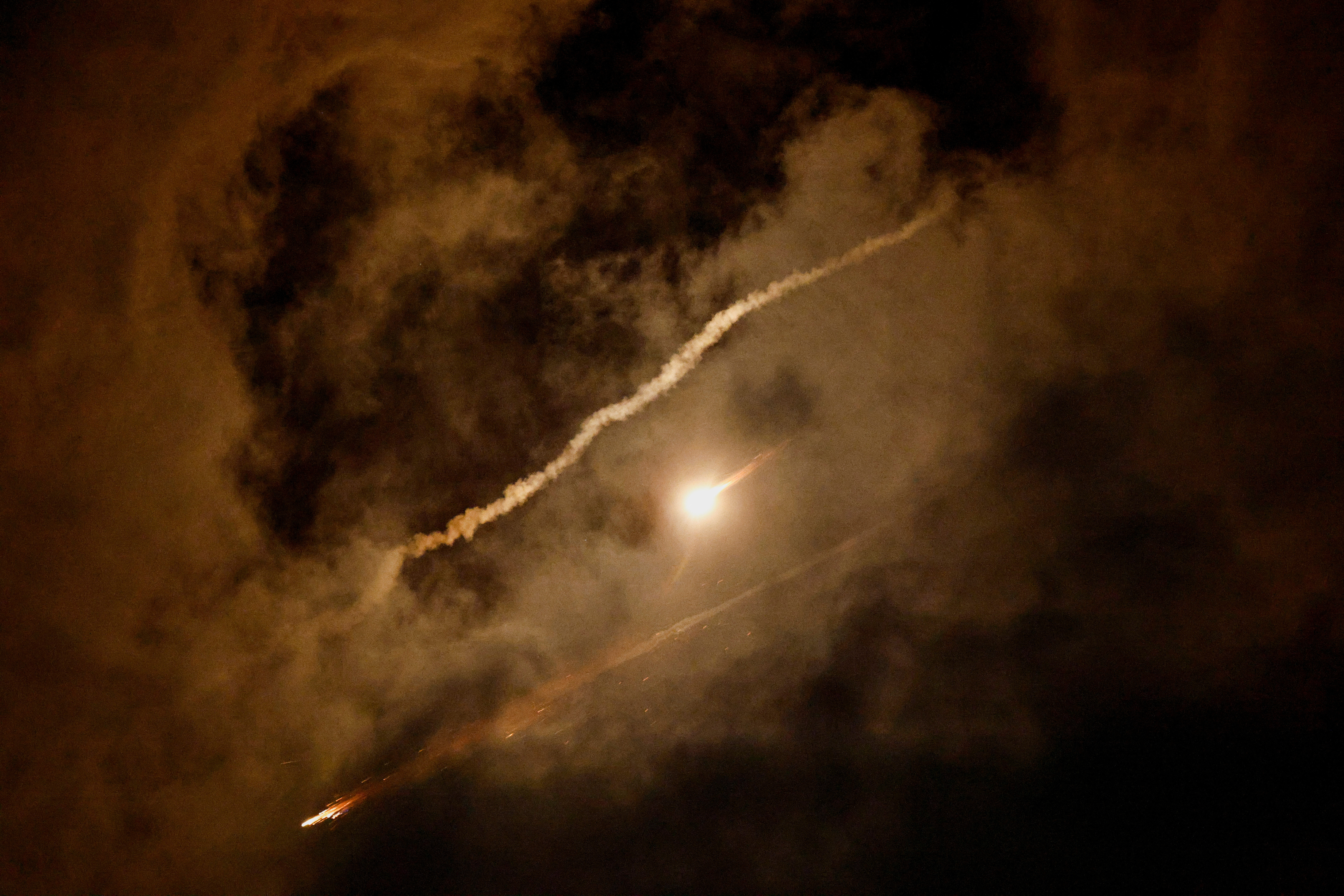 Missiles launched from Iran are intercepted as seen from Ashkelon, Israel, June 18, 2025.