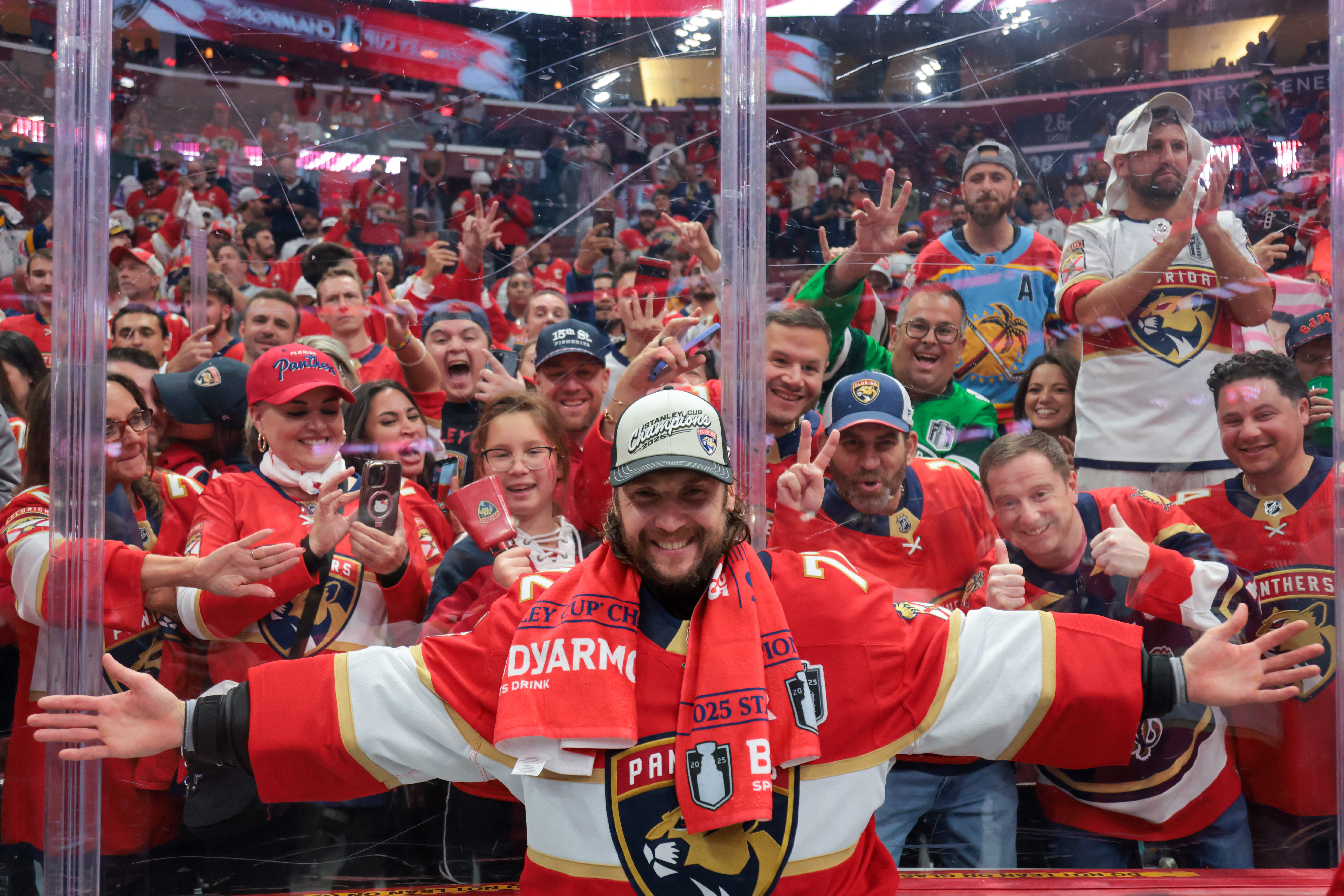 Jun 17, 2025; Sunrise, Florida, USA; Florida Panthers goaltender Sergei Bobrovsky (72) poses for a photo with fans after winning game six of the 2025 Stanley Cup Final against the Edmonton Oilers at Amerant Bank Arena. Mandatory Credit: Sam Navarro-Imagn Images