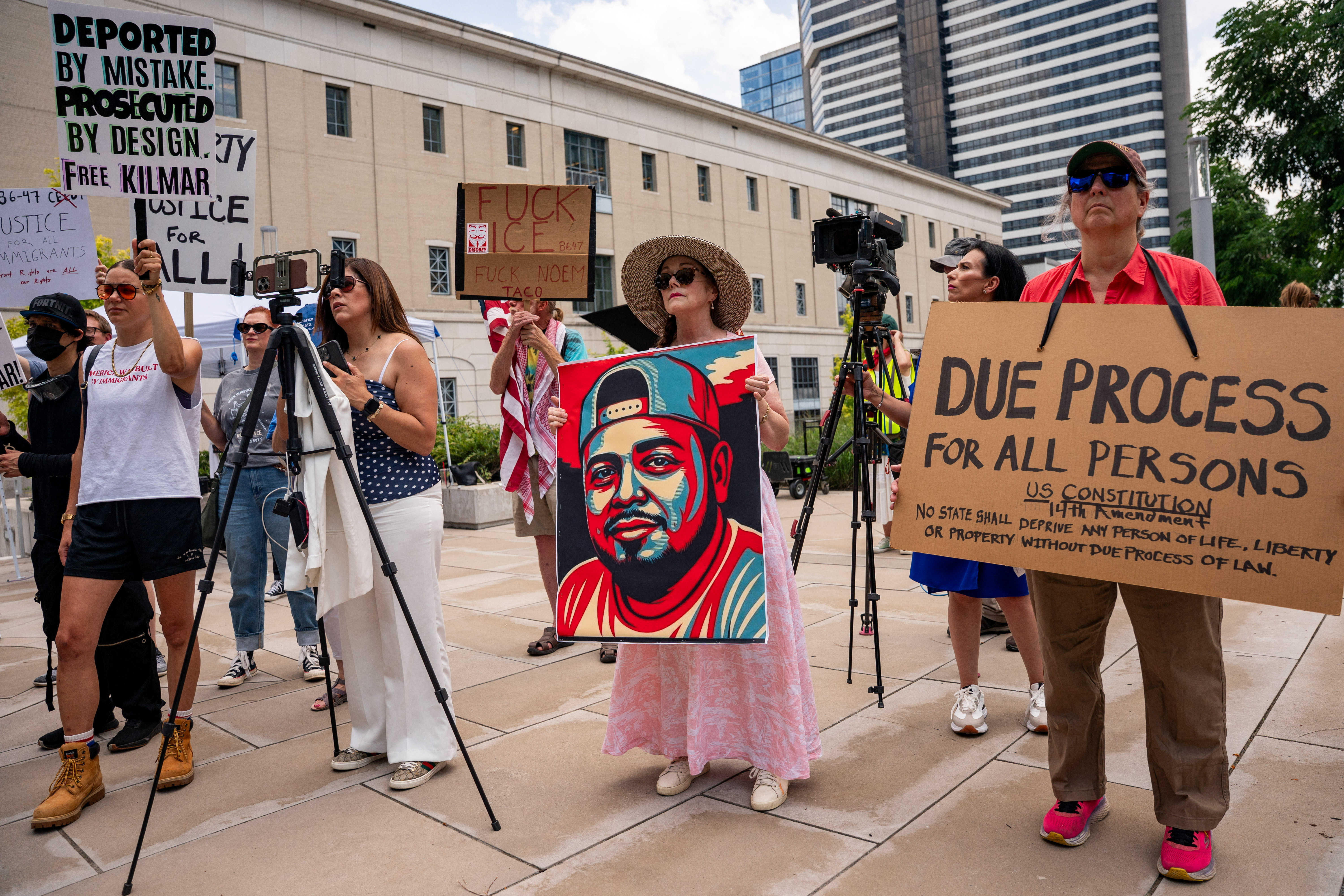 Protesters gather outside of the federal court house in Nashville, Tennessee, US, on June 25, 2025, where a judge determined that Kilmar Abrego Garcia should remain in custody at least temporarily to prevent his possible deportation to a third country. [Reuters/Seth Herald]