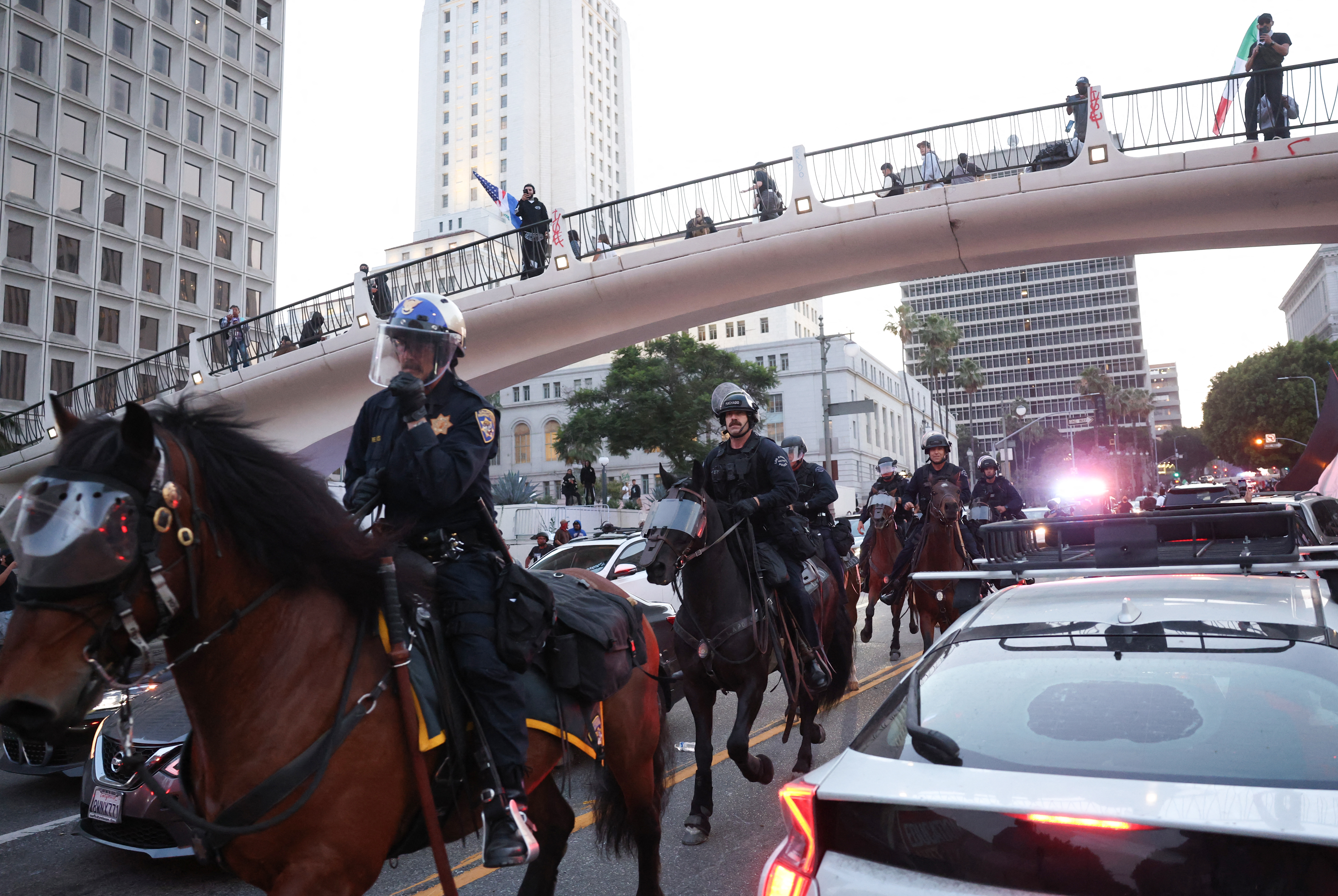 Los Angeles enforced a night-time curfew during protests as Trump sent troops, drawing criticism from officials.