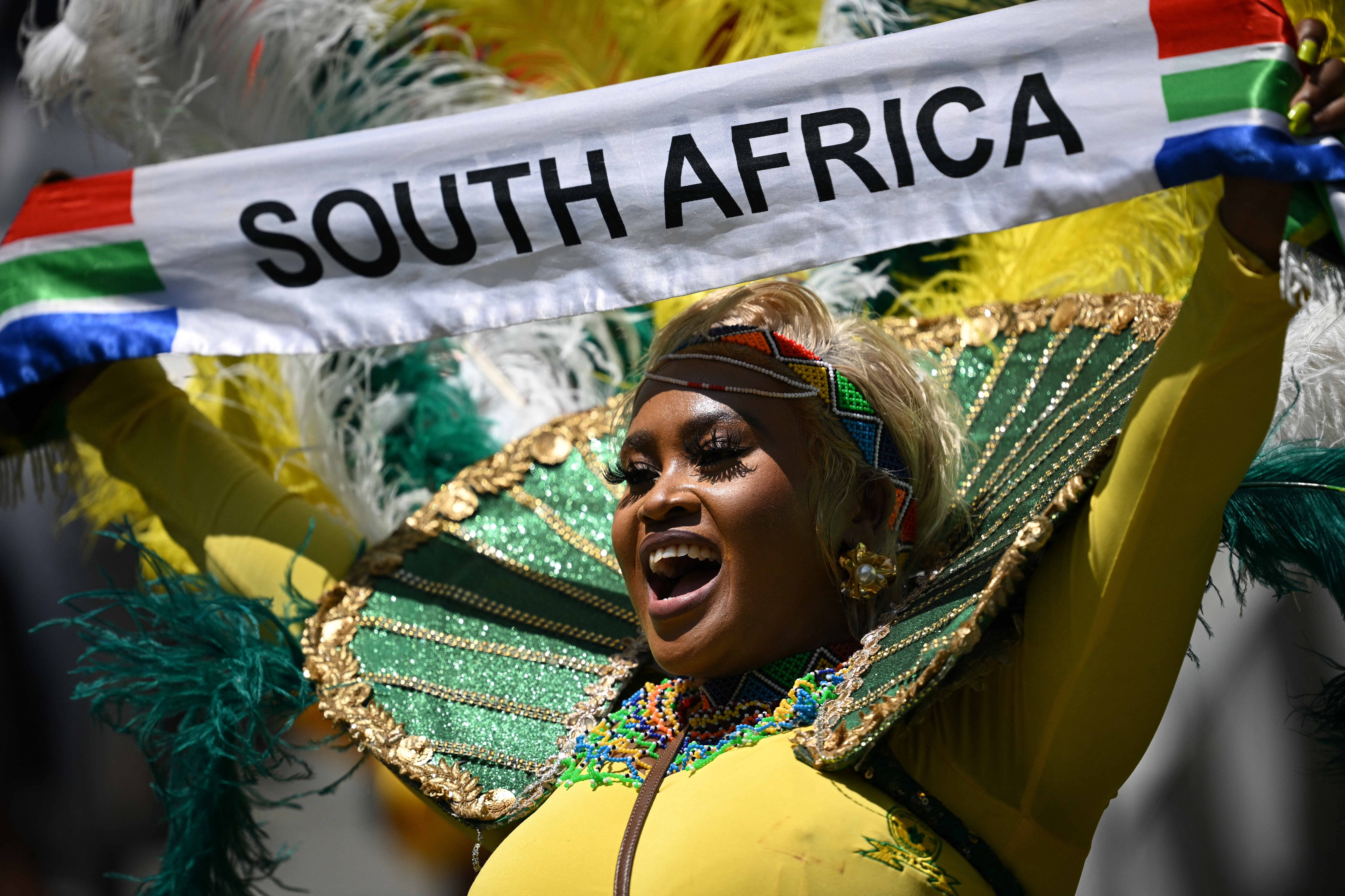 A fan of Sundows cheers for her team ahead of the FIFA Club World Cup 2025 Group F football match between South Africa's Mamelodi Sundowns and Germany's Borussia Dortmund at the TQL stadium in Cincinnati on June 21, 2025. (Photo by Federico PARRA / AFP)