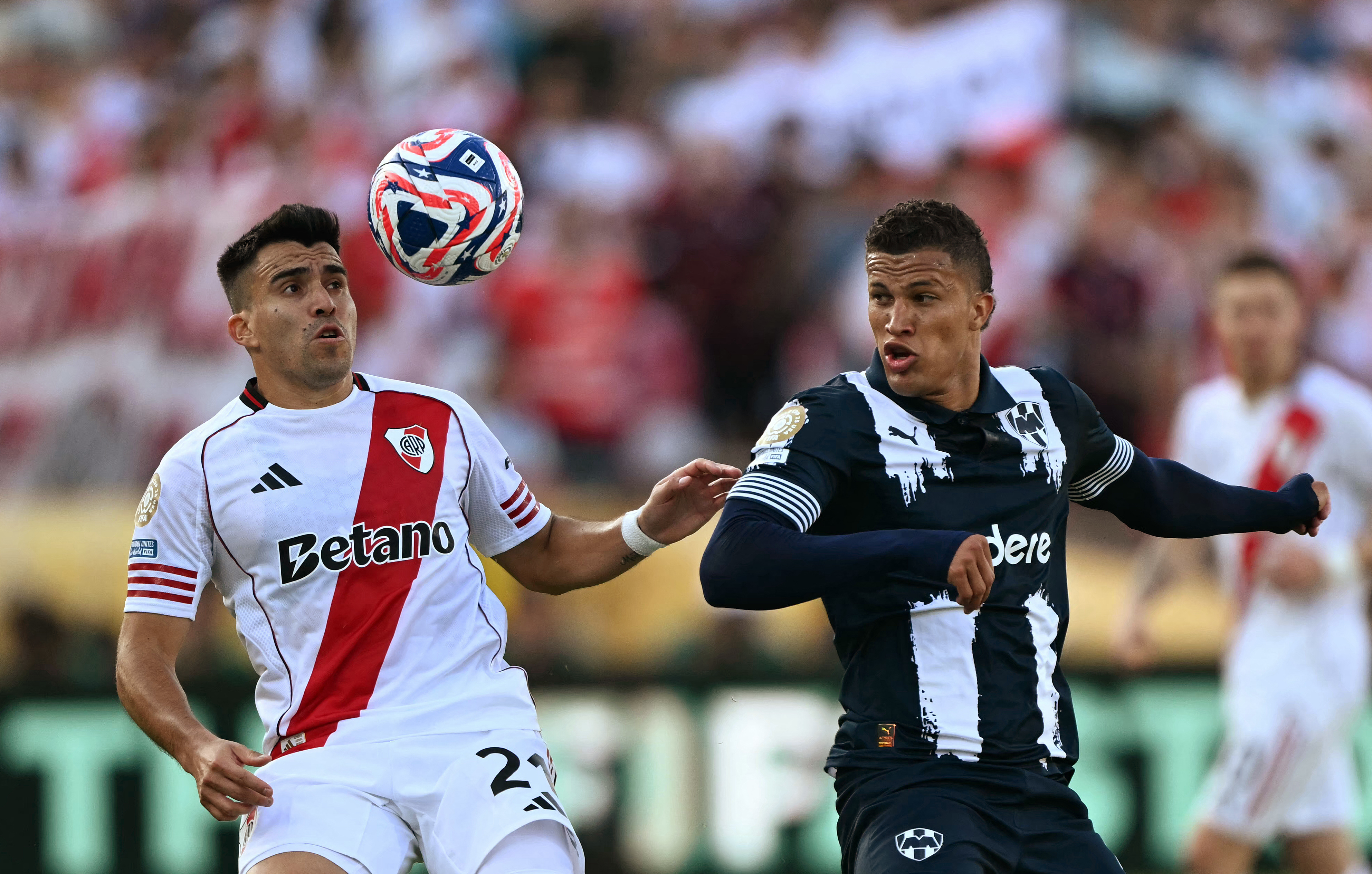 River Plate's Argentine defender #21 Marcos Acuna and Monterrey's Colombian midfielder #06 Nelson Deossa fight for the ball during the FIFA Club World Cup 2025 Group E football match between Argentina's River Plate and Mexico's Monterrey at the Rose Bowl stadium in Los Angeles on June 21, 2025. (Photo by YURI CORTEZ / AFP)
