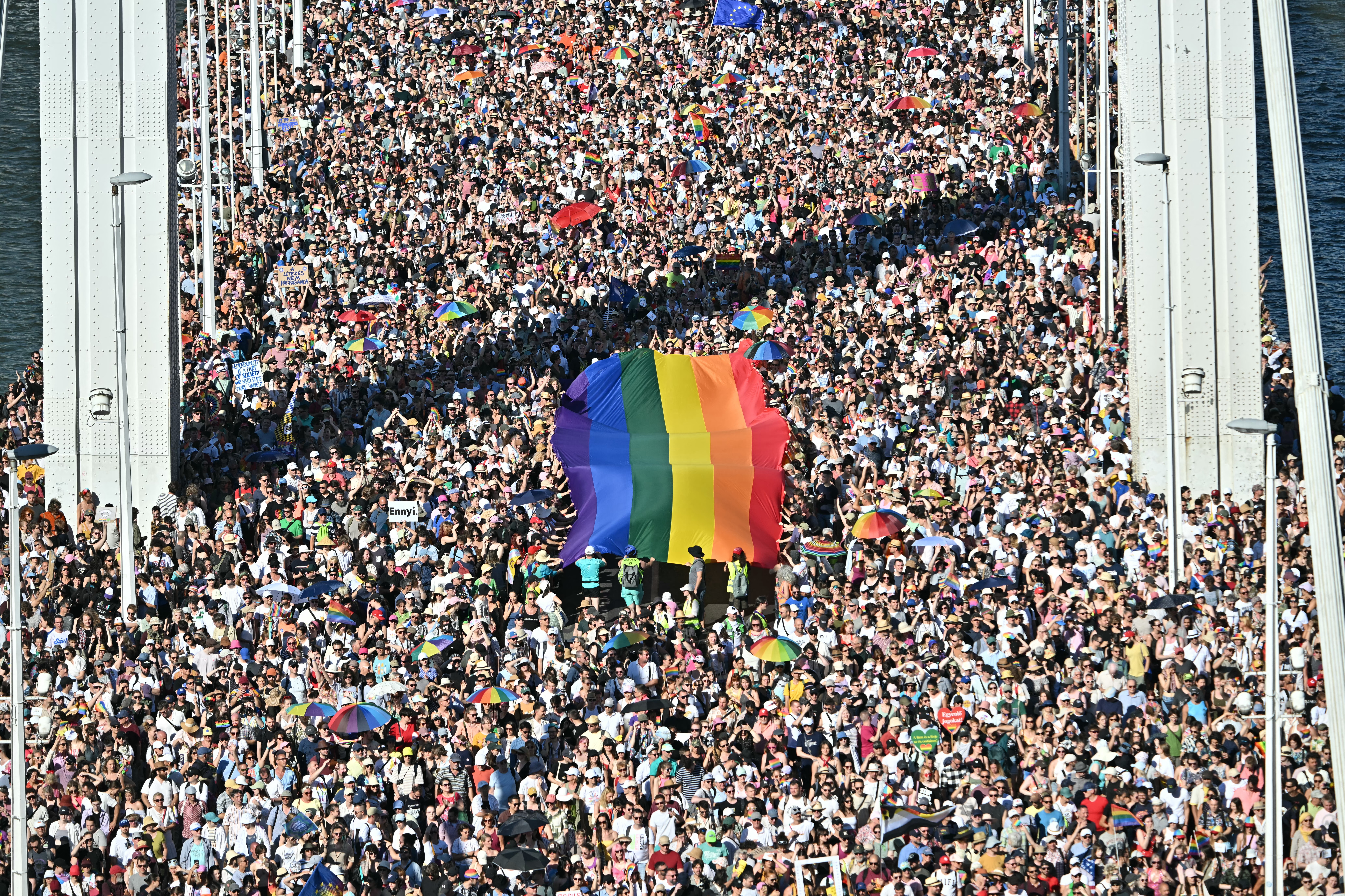 People take part in the Budapest Pride parade in Budapest, Hungary on June 28, 2025 [Attila Kisbenedek/AFP]