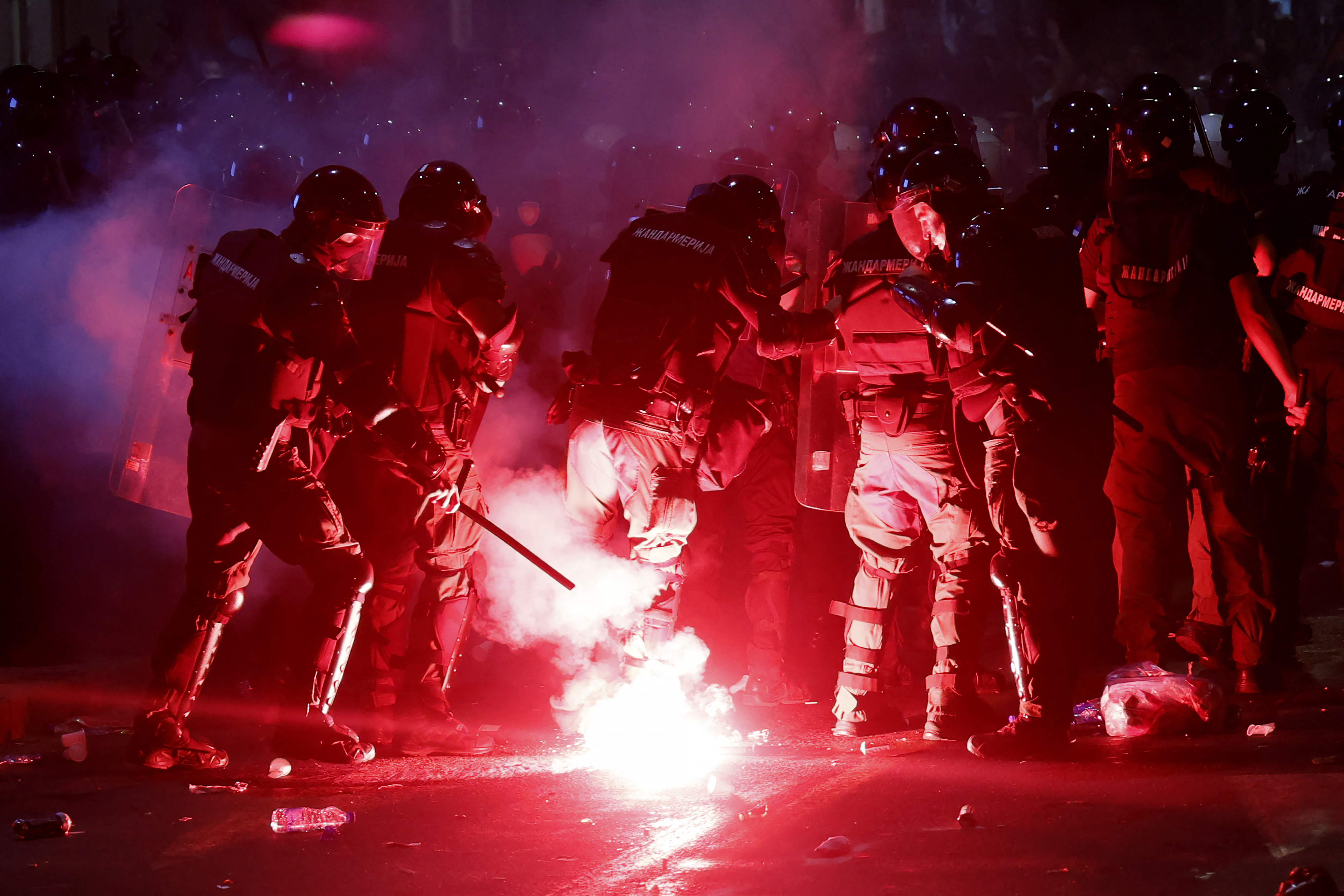 Anti-government protesters clash with riot police in Serbia