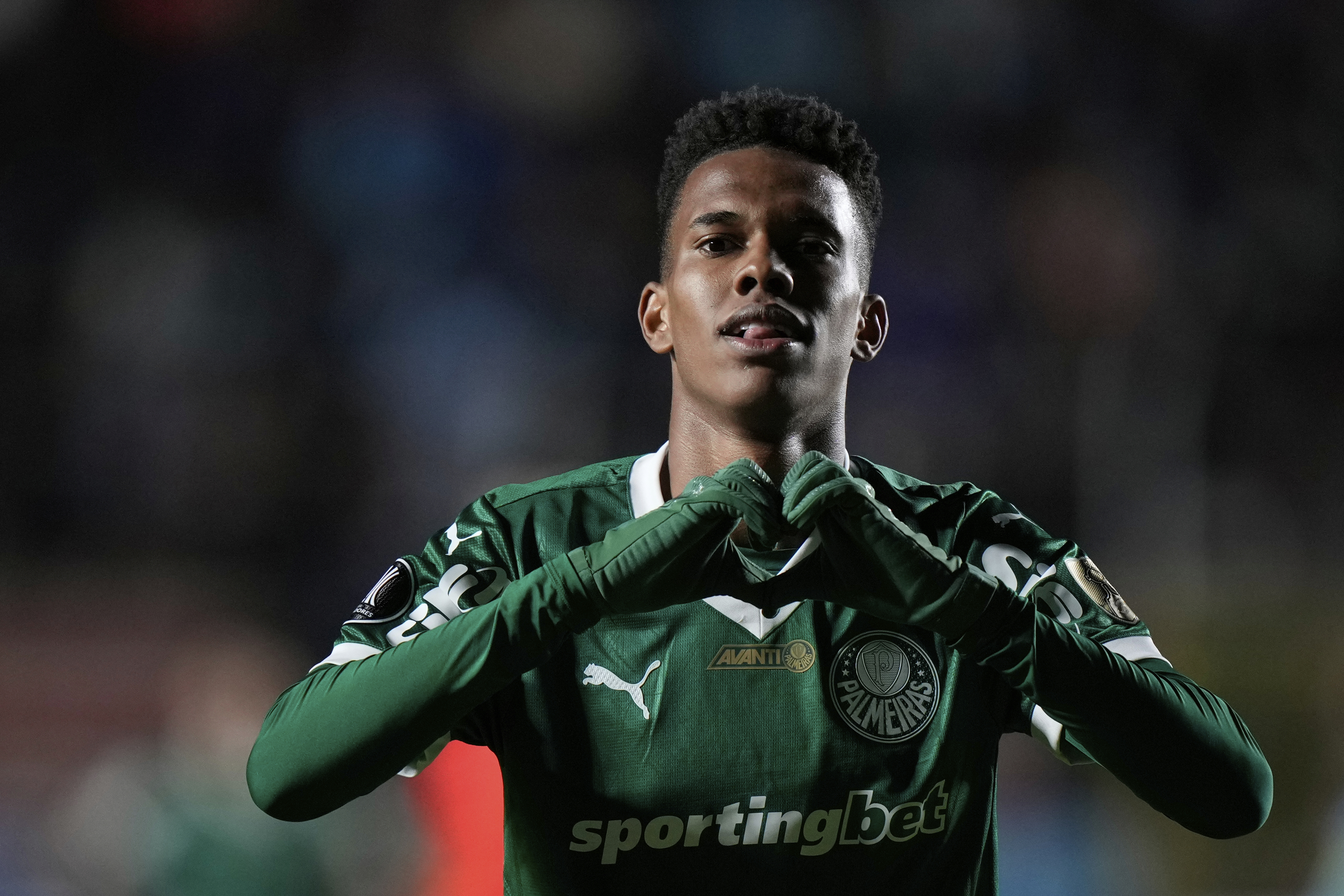 Estevao of Brazil's Palmeiras celebrates scoring his side's second goal against Bolivia's Bolivar during a Copa Libertadores Group G soccer match at the Hernando Siles stadium in La Paz, Bolivia, Thursday, April 24, 2025. (AP Photo/Juan Karita)