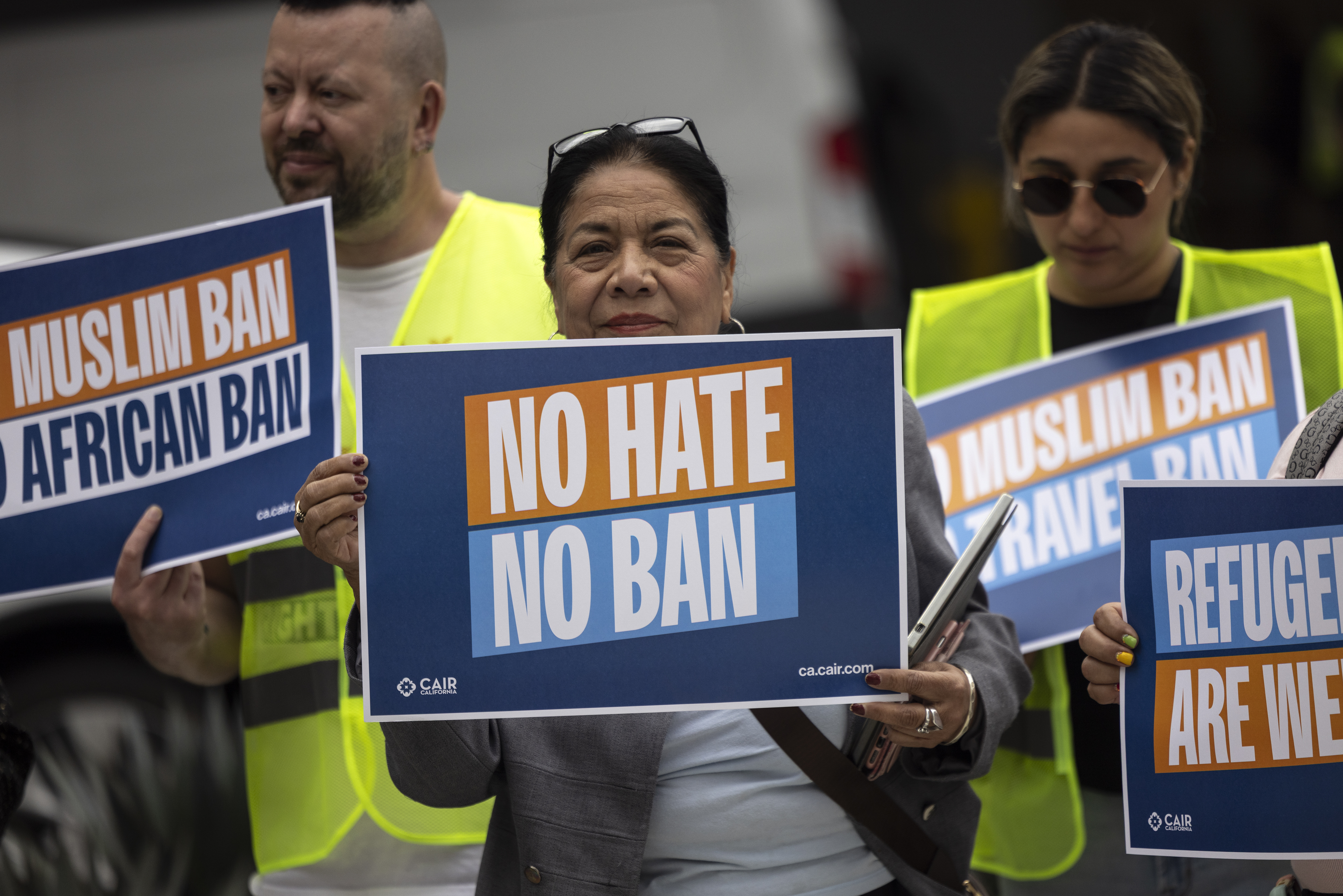Demonstrators gather during a protest against new travel ban announced last week by President Donald Trump at Los Angeles airport, US