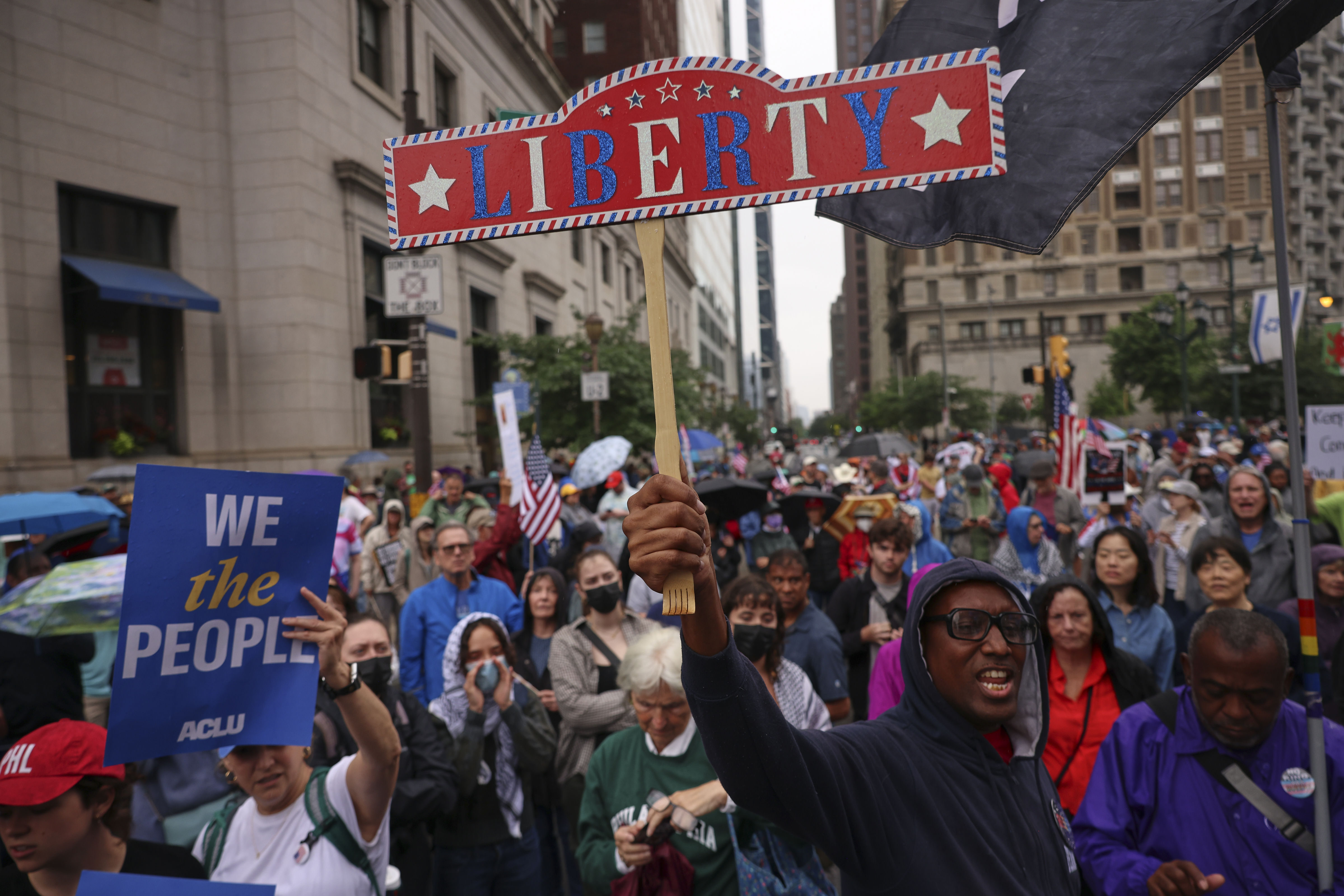 Anti-Trump demonstrators crowd streets across the US
