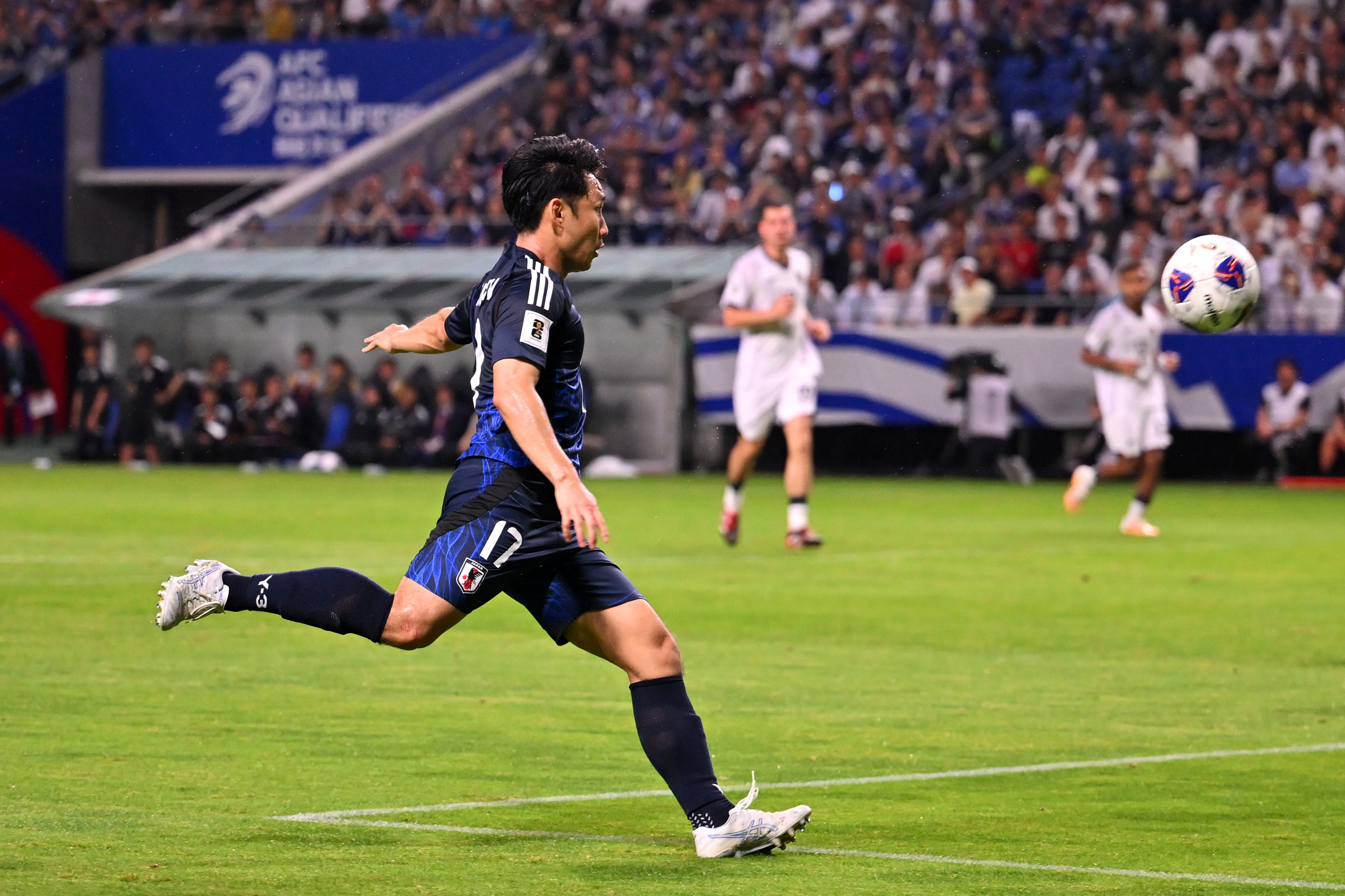 Ryoya Morishita of Japan scores the team's fourth goal during the FIFA World Cup Asian Third Qualifier Group C match between Japan and Indonesia 