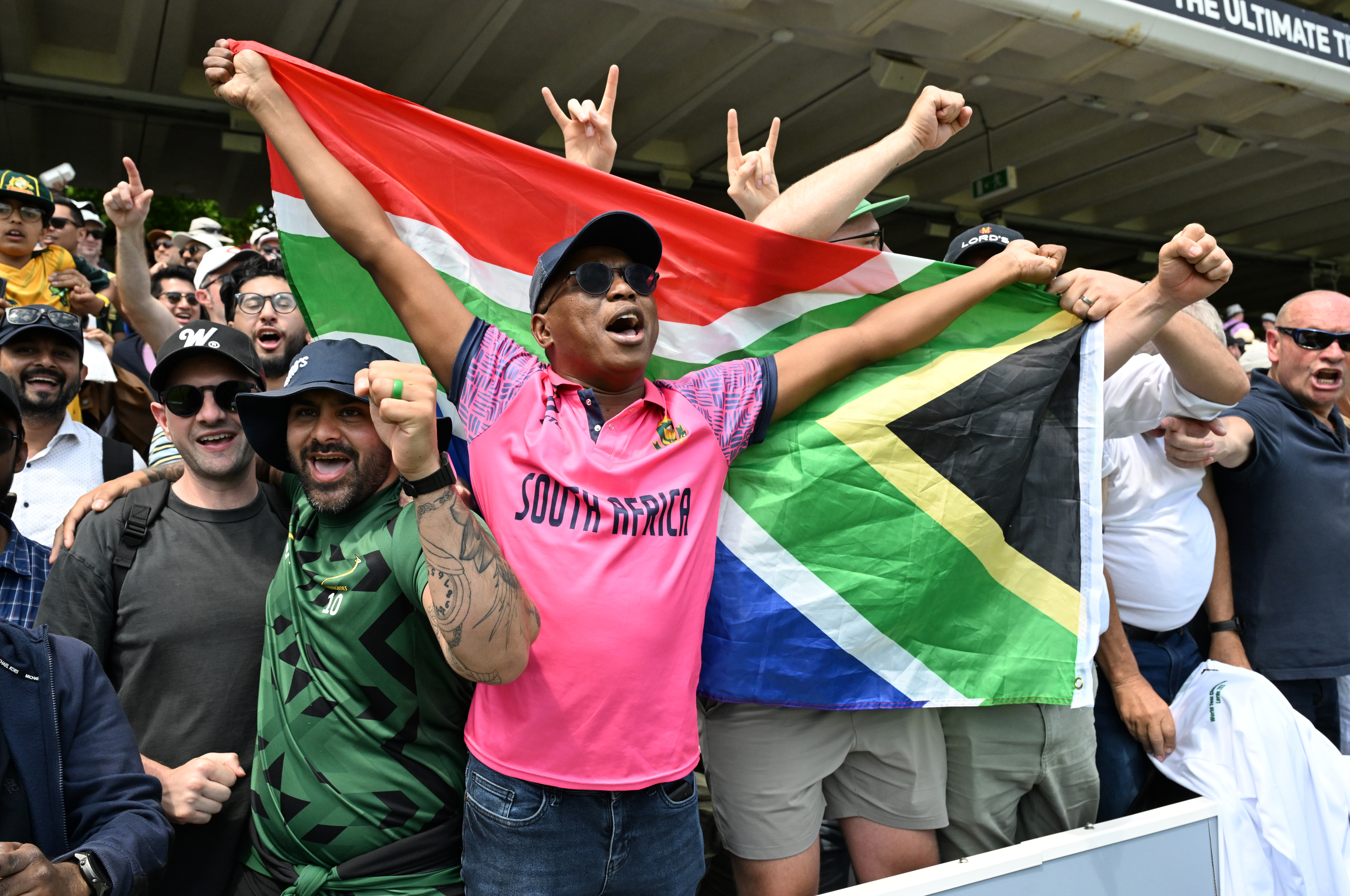 Fans of South Africa celebrate following their team's victory on Day Four of the ICC World Test Championship Final between South Africa and Australia at Lord's Cricket Ground