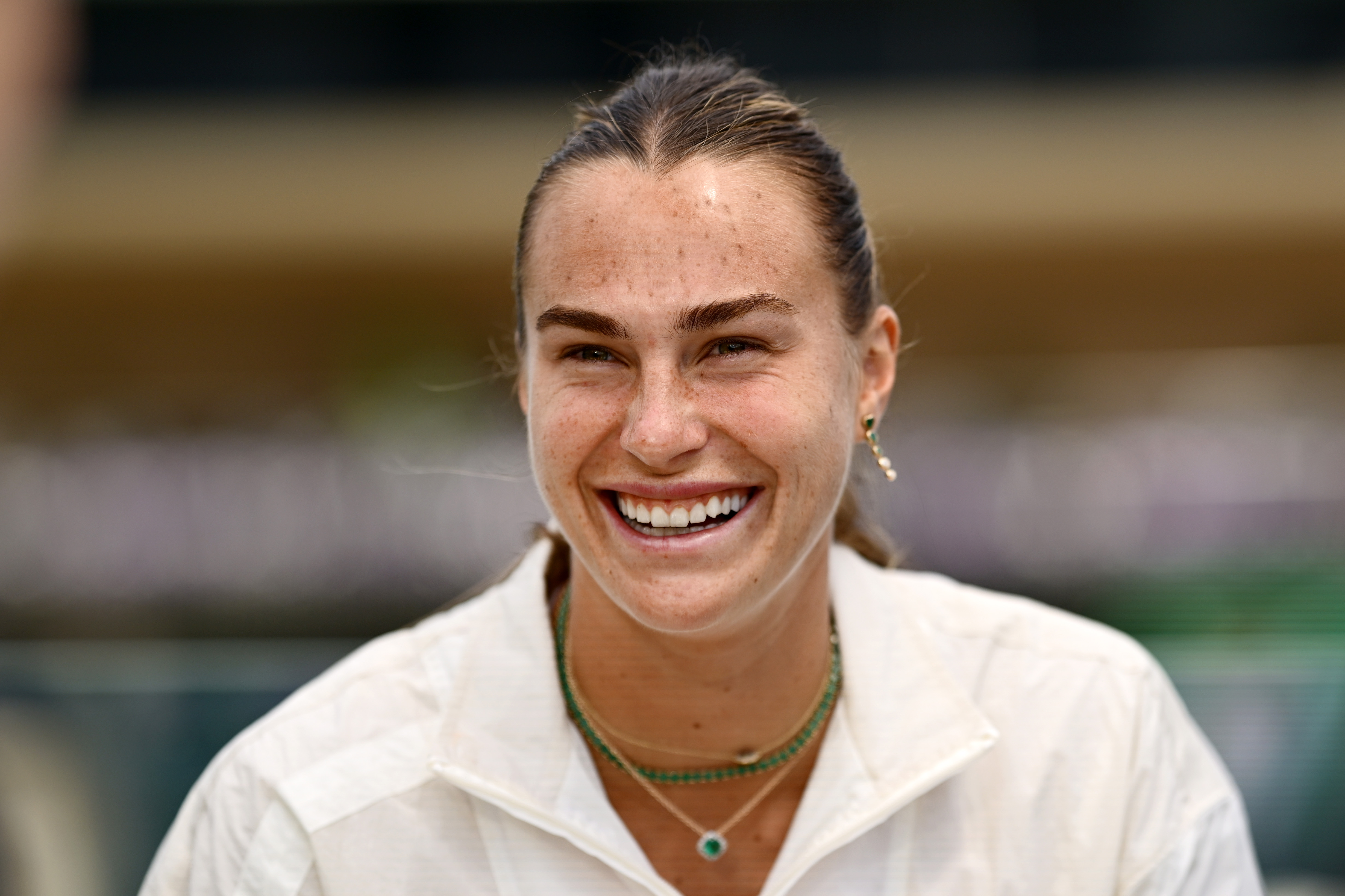 LONDON, ENGLAND - JUNE 28: Aryna Sabalenka smiles as she speaks in an interview prior to The Championships Wimbledon 2025 at All England Lawn Tennis and Croquet Club on June 28, 2025 in London, England. (Photo by Hannah Peters/Getty Images)