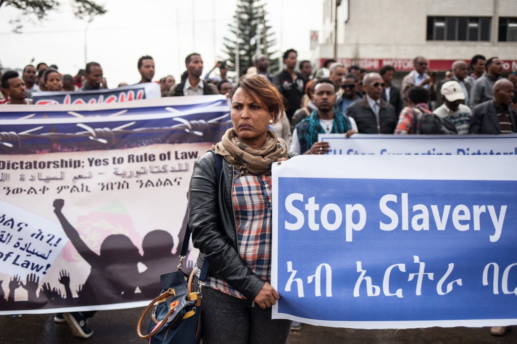 Hundreds of Eritreans demonstrate in front of the African Union headquarters in support of the UN Inquiry report and asking for measures to be taken against Eritrea on June 26, 2015 in Addis Ababa. [File: Nichole Sobecki/AFP]