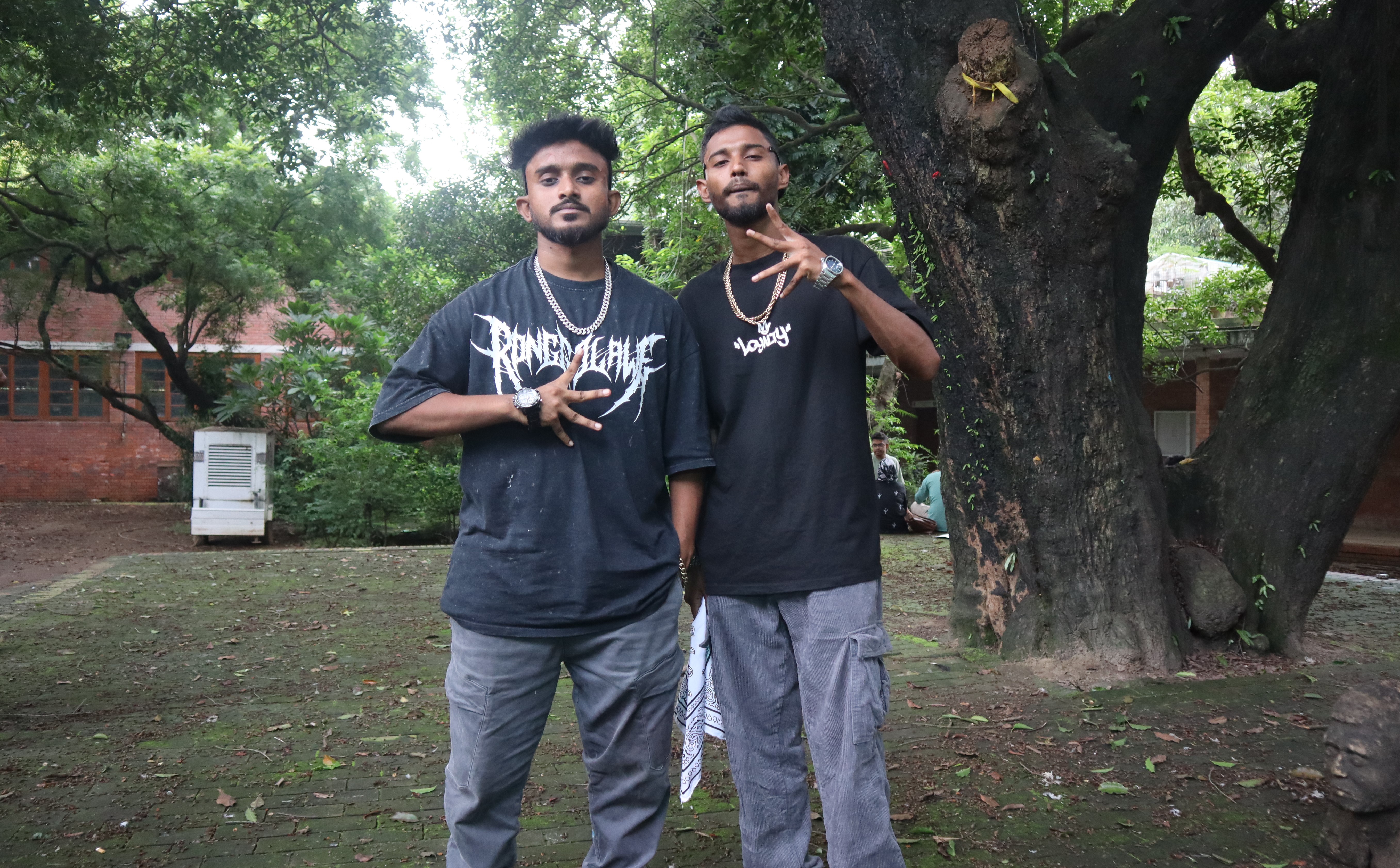Rappers Shezan (left) and Hannan before a musical event on the University of Dhaka campus after the fall of Sheikh Hasina's government [Masum Billah/Al Jazeera]