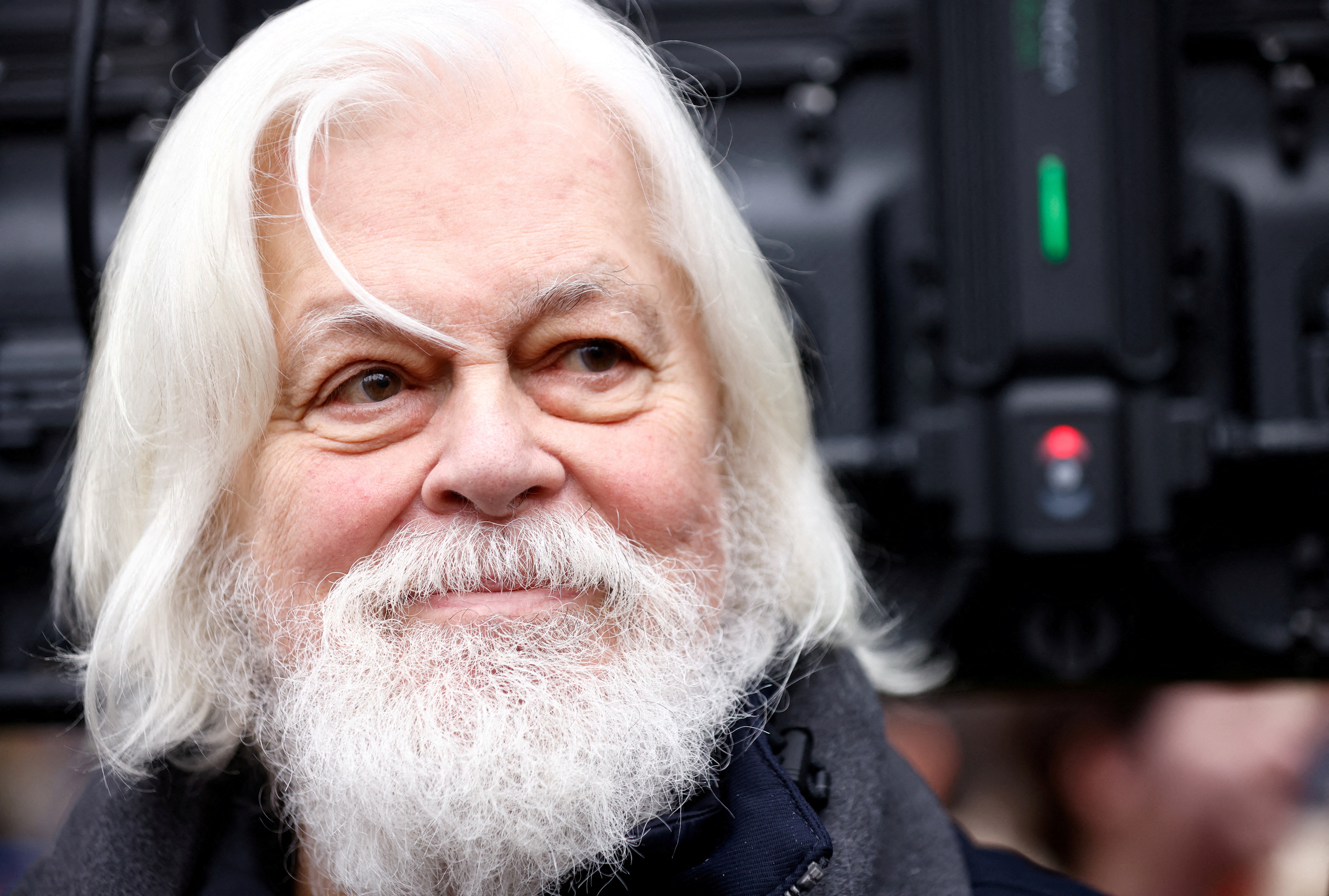 U.S.-Canadian anti-whaling environmental activist Paul Watson looks on while talking to journalists during a press conference as part of a gathering by Sea Shepherd France and Vakita to welcome Watson after he was released from prison in Greenland's capital Nuuk after five months in detention, at the Place de la Republique in Paris, France, December 21, 2024. REUTERS/Johanna Geron TPX IMAGES OF THE DAY