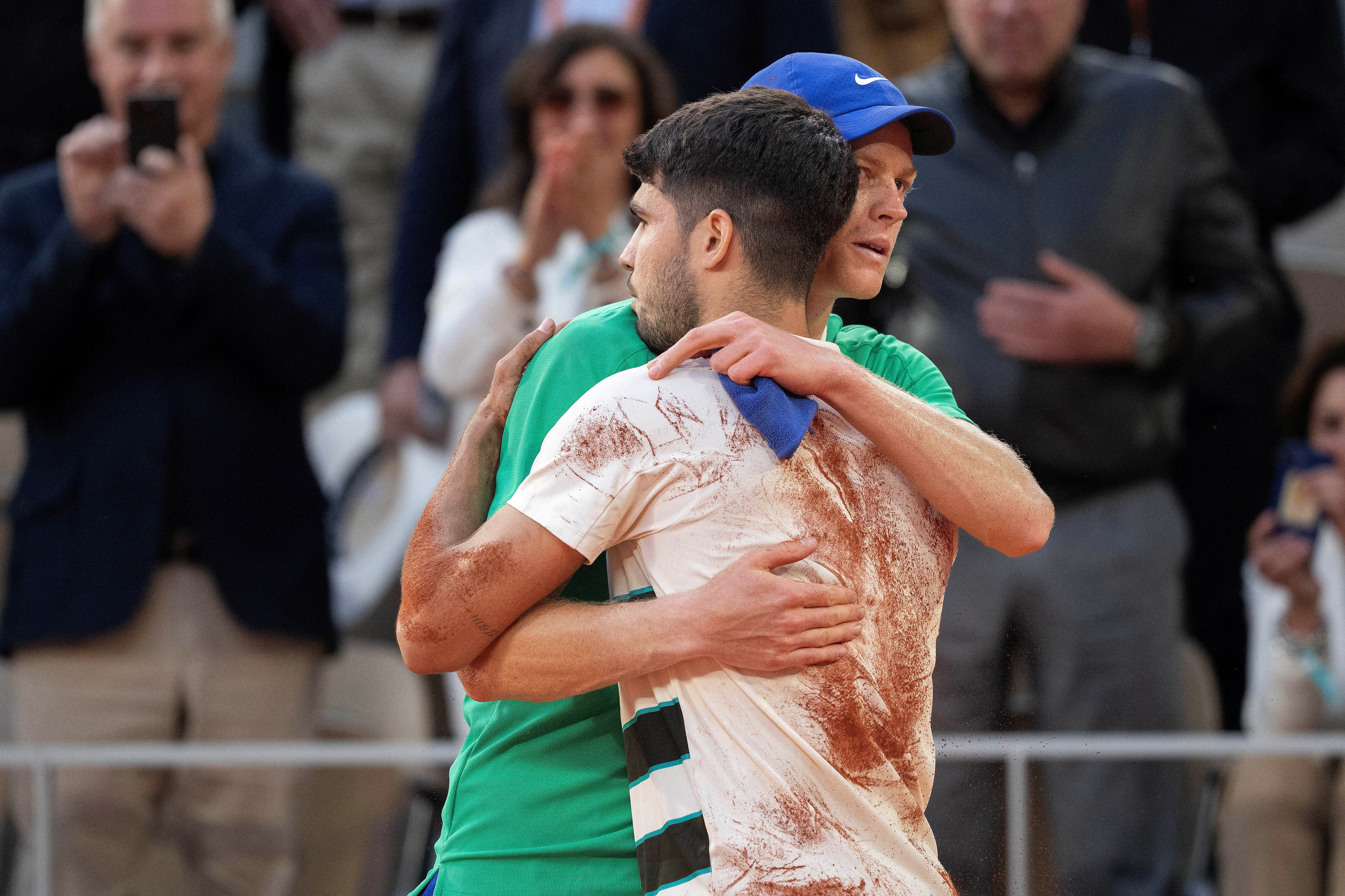 FILE PHOTO: Jun 8, 2025; Paris, FR; Carlos Alcaraz of Spain and Jannik Sinner of Italy after the men's singles final match on day 15 at Roland Garros Stadium. Mandatory Credit: Susan Mullane-Imagn Images/File Photo