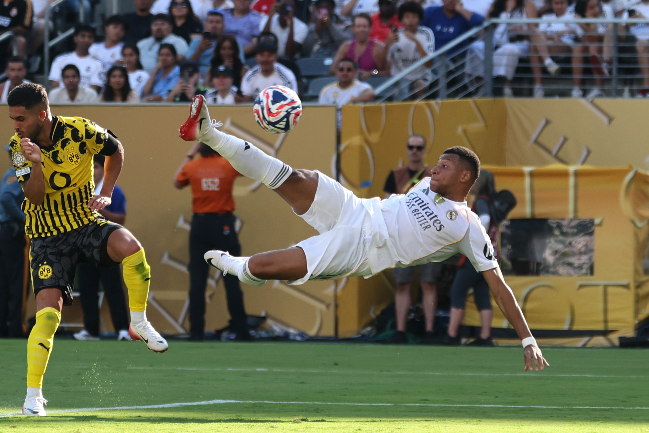 Real Madrid CF forward Kylian Mbappe (9) scores a goal against Borussia Dortmund goalkeeper Gregor Kobel (1) in the second half during a quarterfinal match of the 2025 FIFA Club World Cup