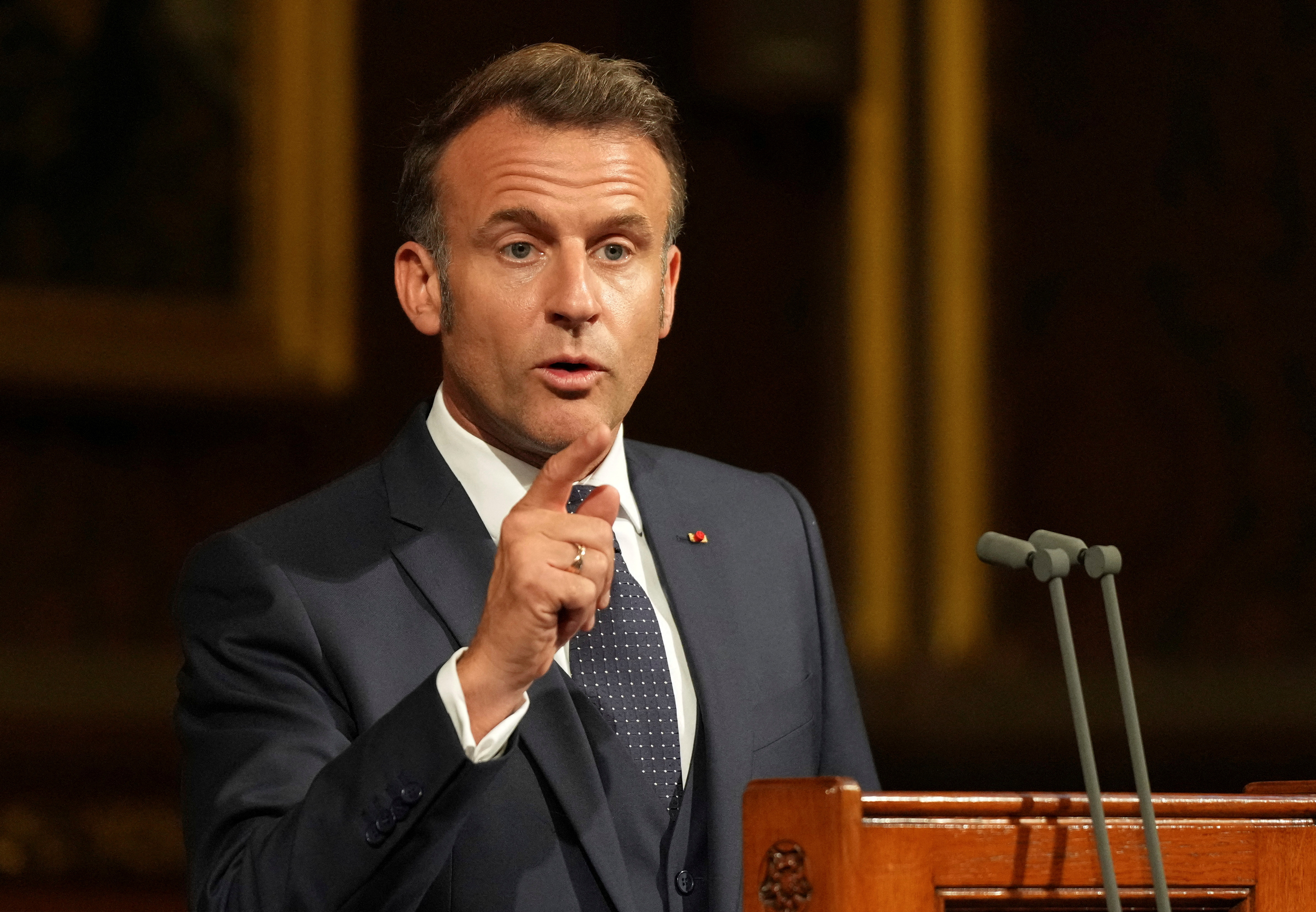 French President Emmanuel Macron addresses parliament in the Palace of Westminster