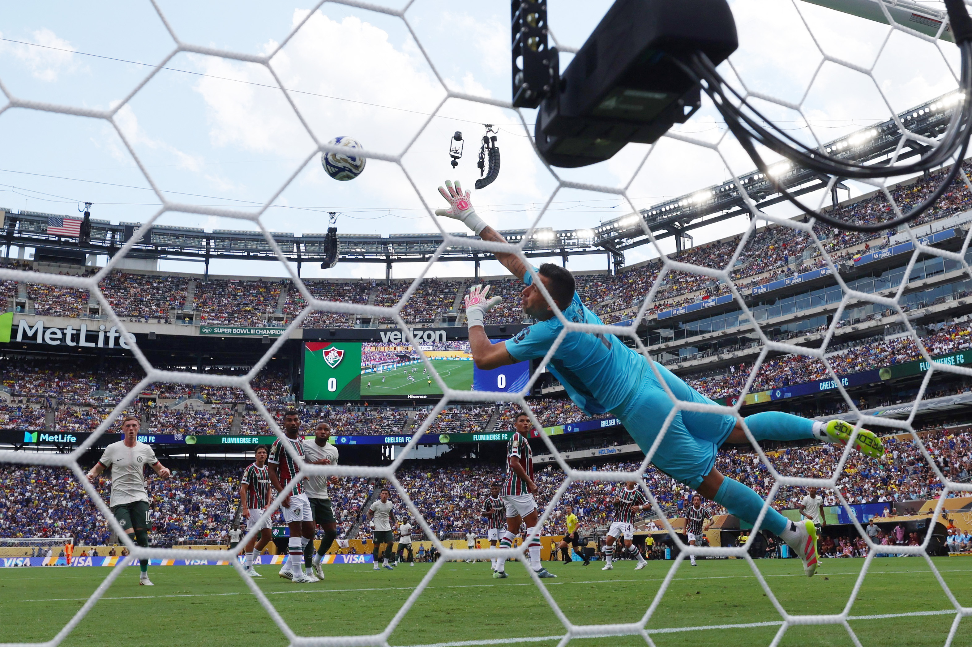 Chelsea's Joao Pedro scores their first goal past Fluminense's Fabio