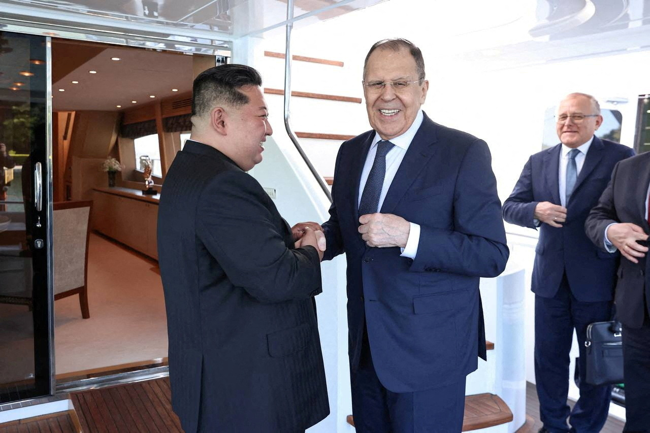 North Korean leader Kim Jong Un shakes hands with Russian Foreign Minister Sergei Lavrov during a meeting in Wonsan, North Korea July 12, 2025. Russian Foreign Ministry/Handout via REUTERS ATTENTION EDITORS - THIS IMAGE HAS BEEN SUPPLIED BY A THIRD PARTY. NO RESALES. NO ARCHIVES. MANDATORY CREDIT. TPX IMAGES OF THE DAY
