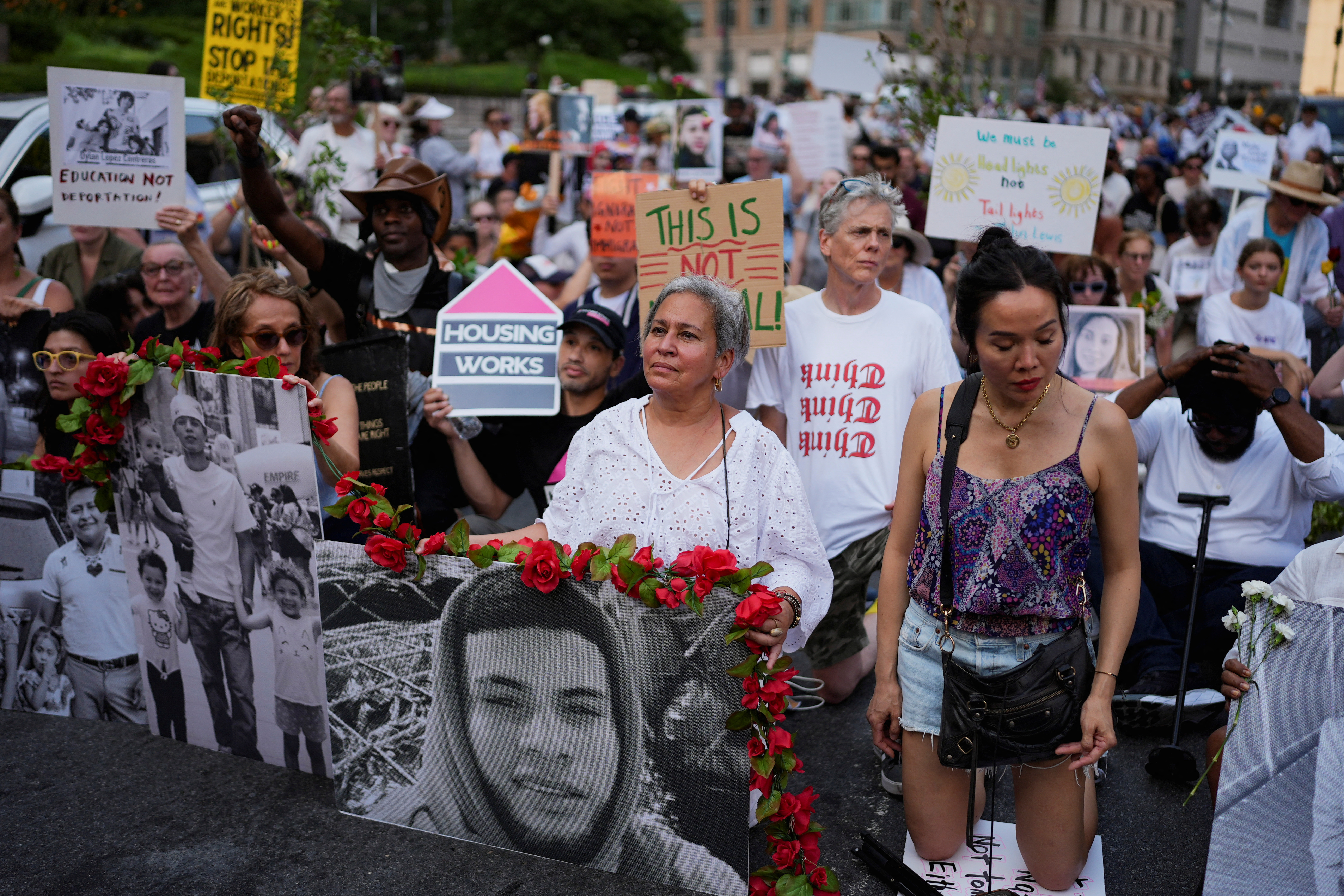 People take part in a "Good Trouble Lives On" protest.