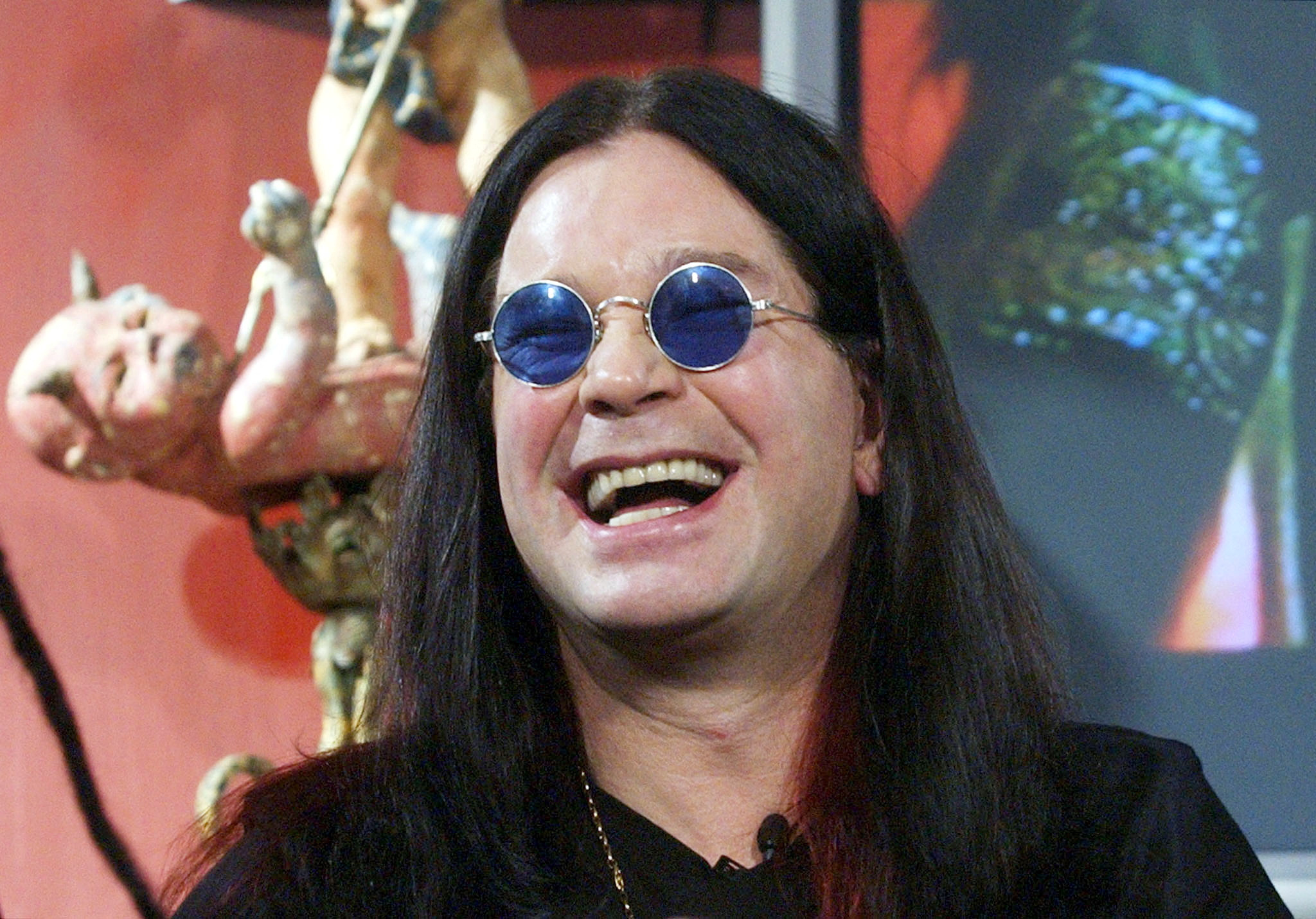 FILE PHOTO: Ozzy Osbourne speaks with reporters during a news conference at Osbourne's Beverly Hills home February 18, 2003. Osbourne announced the bands who will perform on the 8th Ozzfest 28-city tour, which includes Korn and Marilyn Manson. The tour opens in San Antonio, Texas June 28. REUTERS/Jim Ruymen/File Photo