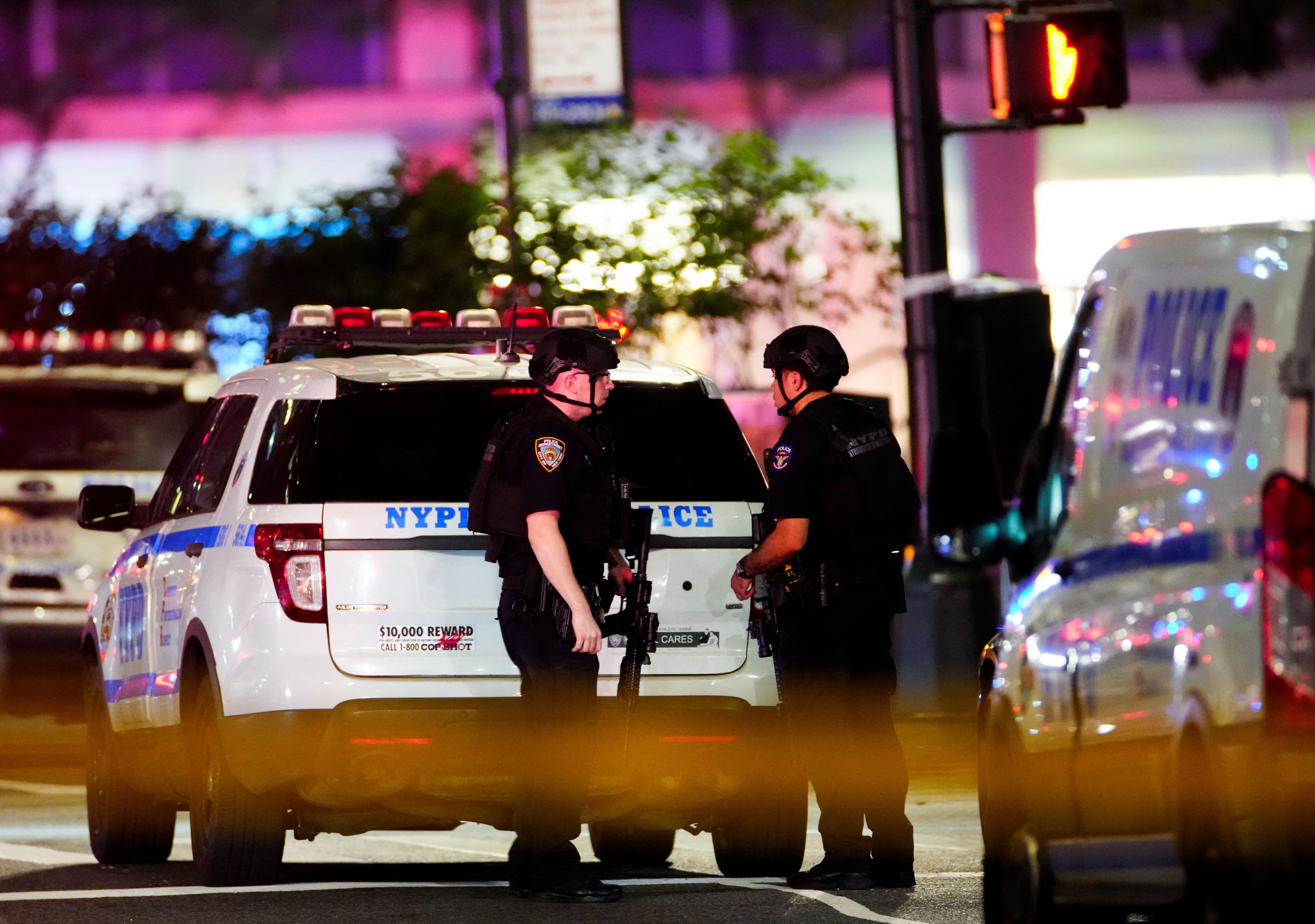 Police officers near the scene of a shooting in the Manhattan borough of New York