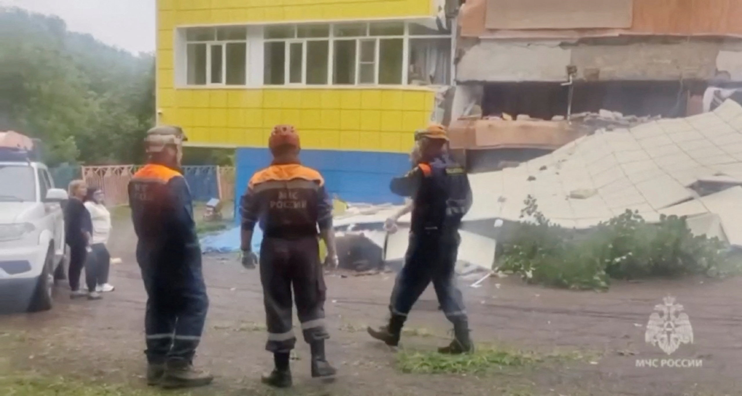 Emergency services personnel work at a kindergarten damaged by an earthquake, in Petropavlovsk-Kamchatsky, Kamchatka Krai, Russia, July 30, 2025 in this screen grab from handout video. Russian Ministry for Emergencies/Handout via REUTERS THIS IMAGE HAS BEEN SUPPLIED BY A THIRD PARTY. DO NOT OBSCURE LOGO. Verification: - Building, road layout, and building exteriors match file and satellite imagery - Date confirmed by the corroborating local reports and official statements