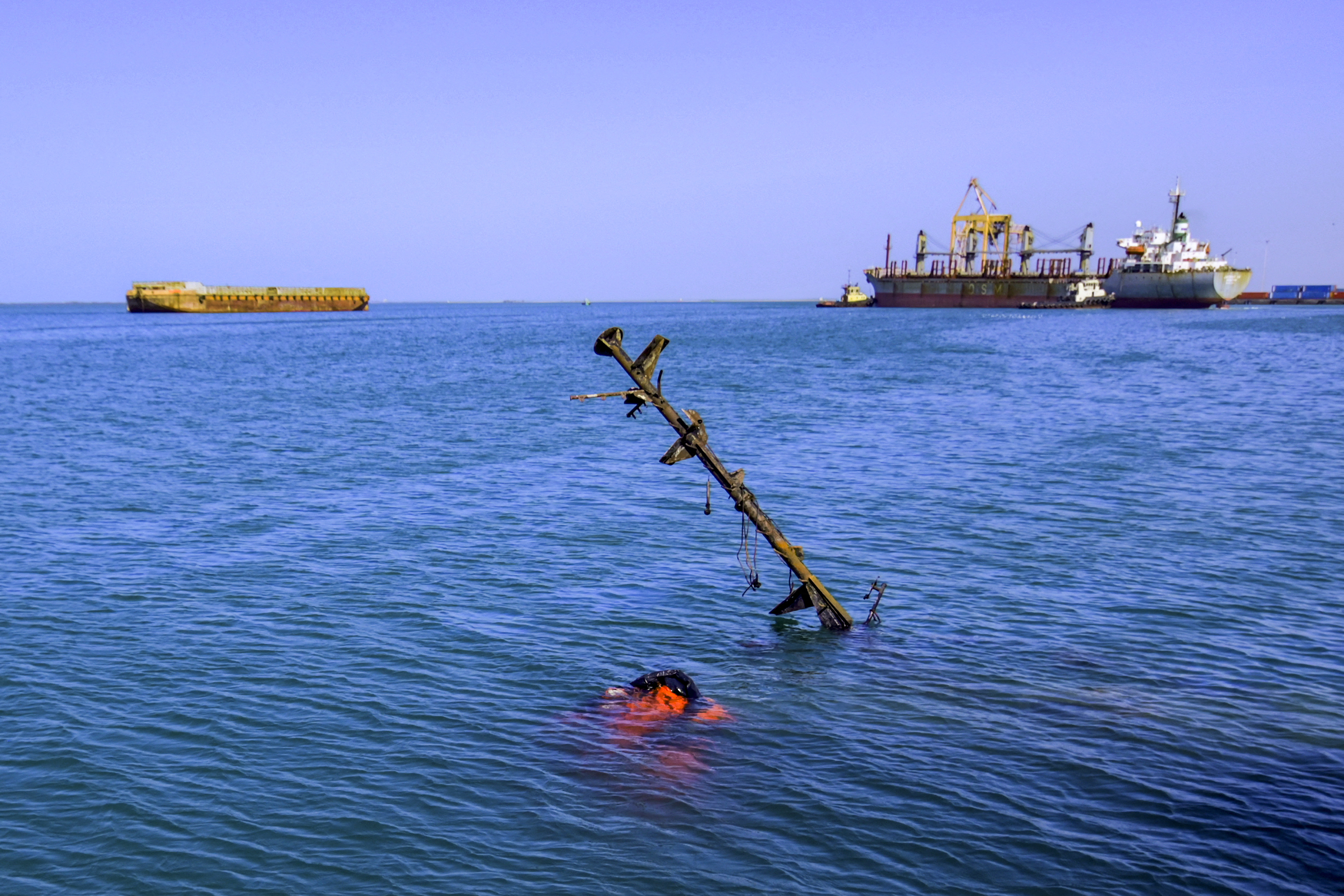 A sunken vessel is pictured at a site hit by Israeli forces in the Huthi-controlled port of Hodeida on the Red Sea on