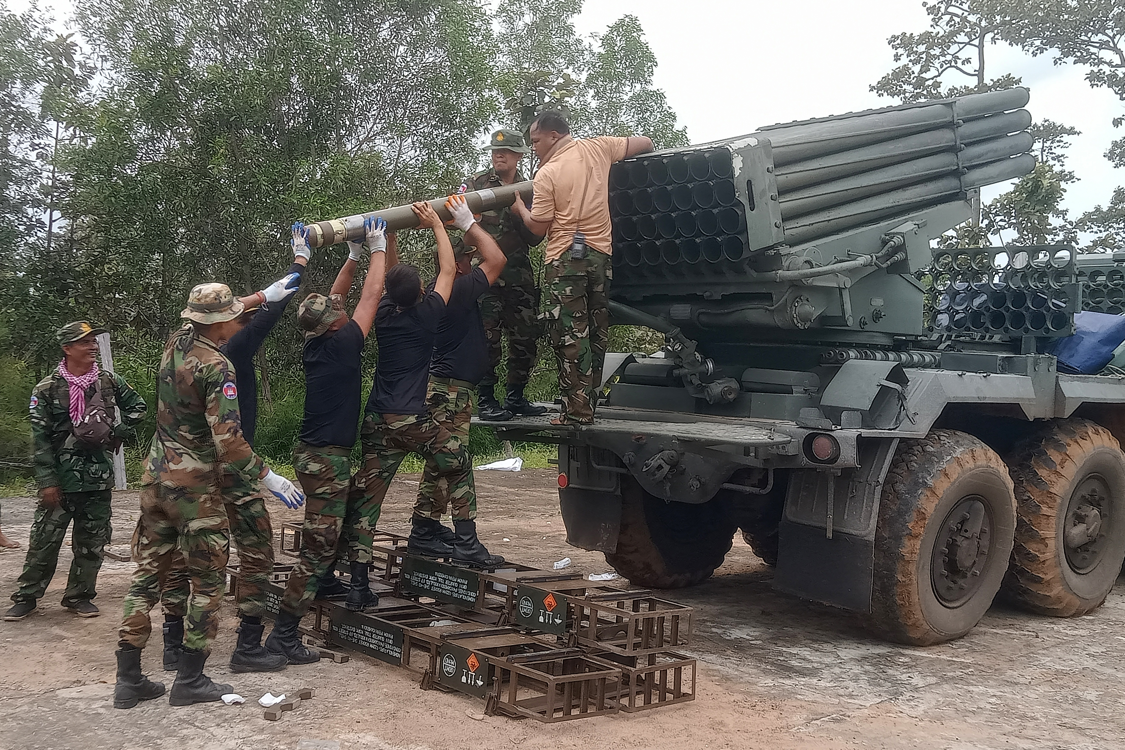 Cambodian soldiers reload the BM-21 multiple rocket launcher in Preah Vihear province on July 24, 2025