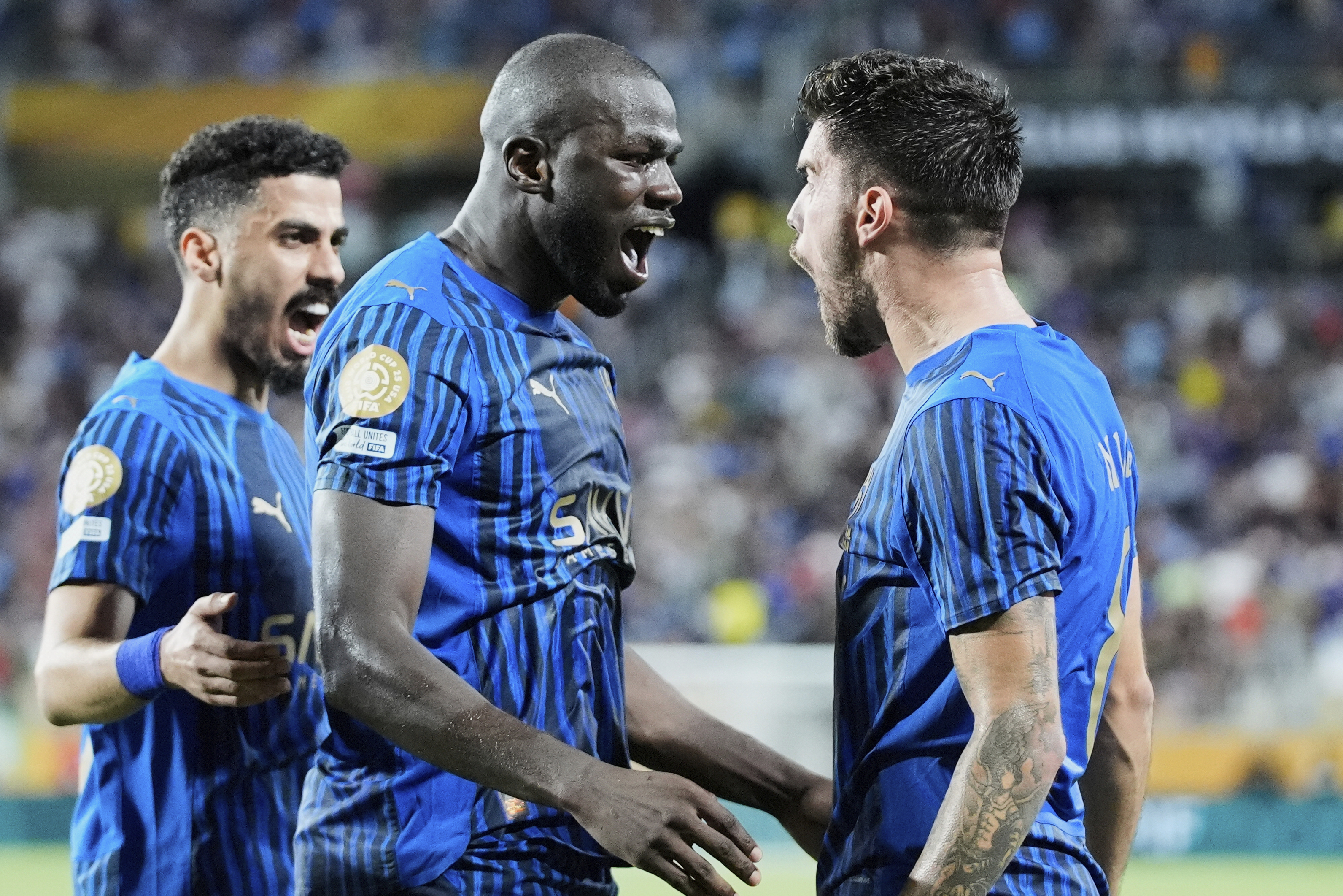 Al Hilal's Kalidou Koulibaly, centre, celebrates with teammates after scoring his team's third goal during the Club World Cup round of 16 soccer match between Manchester City and Al Hilal in Orlando, Fla., Monday, June 30, 2025. (AP Photo/John Raoux)
