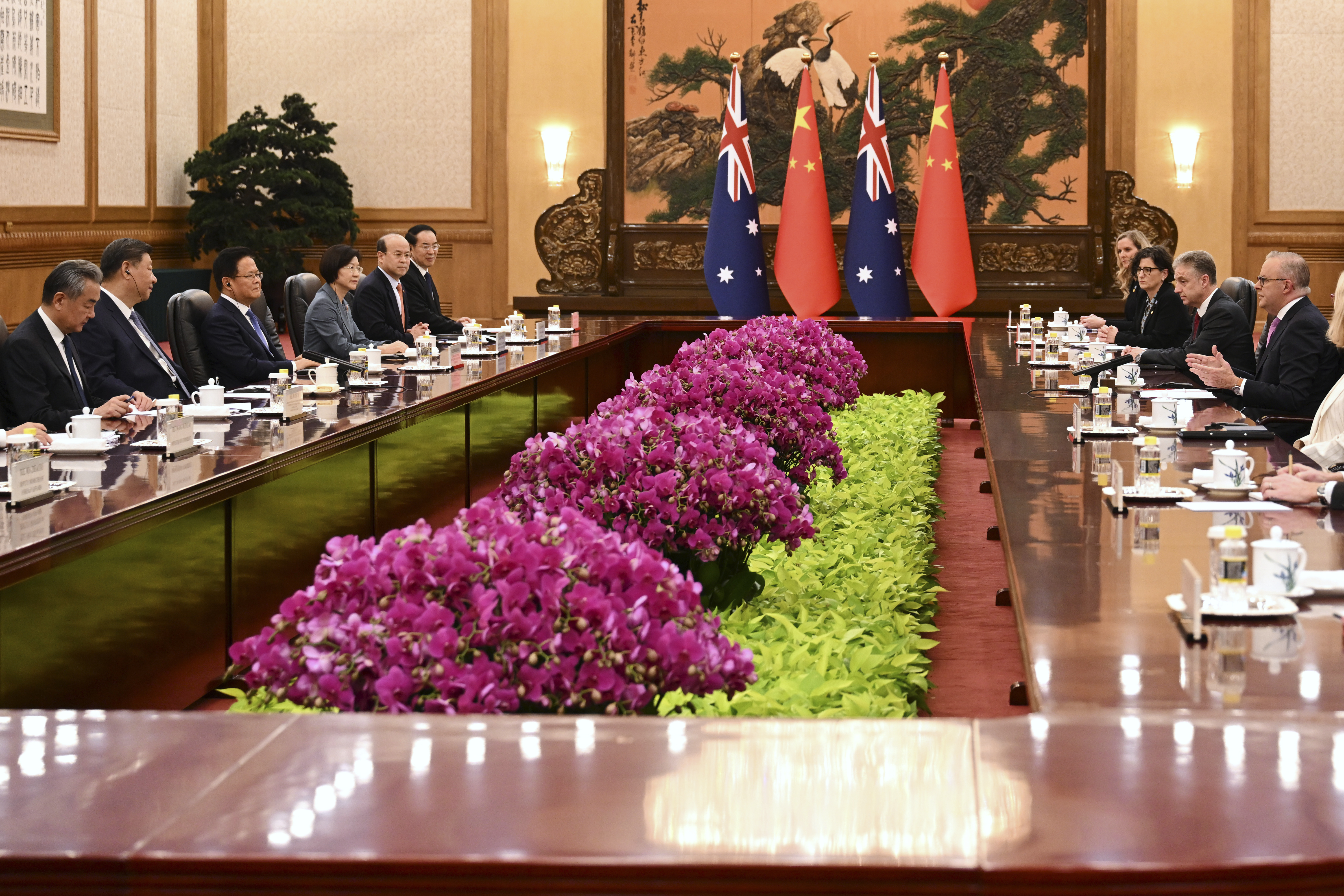 Australian Prime Minister Anthony Albanese, right, talks to China's President Xi Jinping, second left, in the Great Hall of the People in Beijing, China, Tuesday, July 15, 2025. (Lukas Coch/AAP Image via AP)