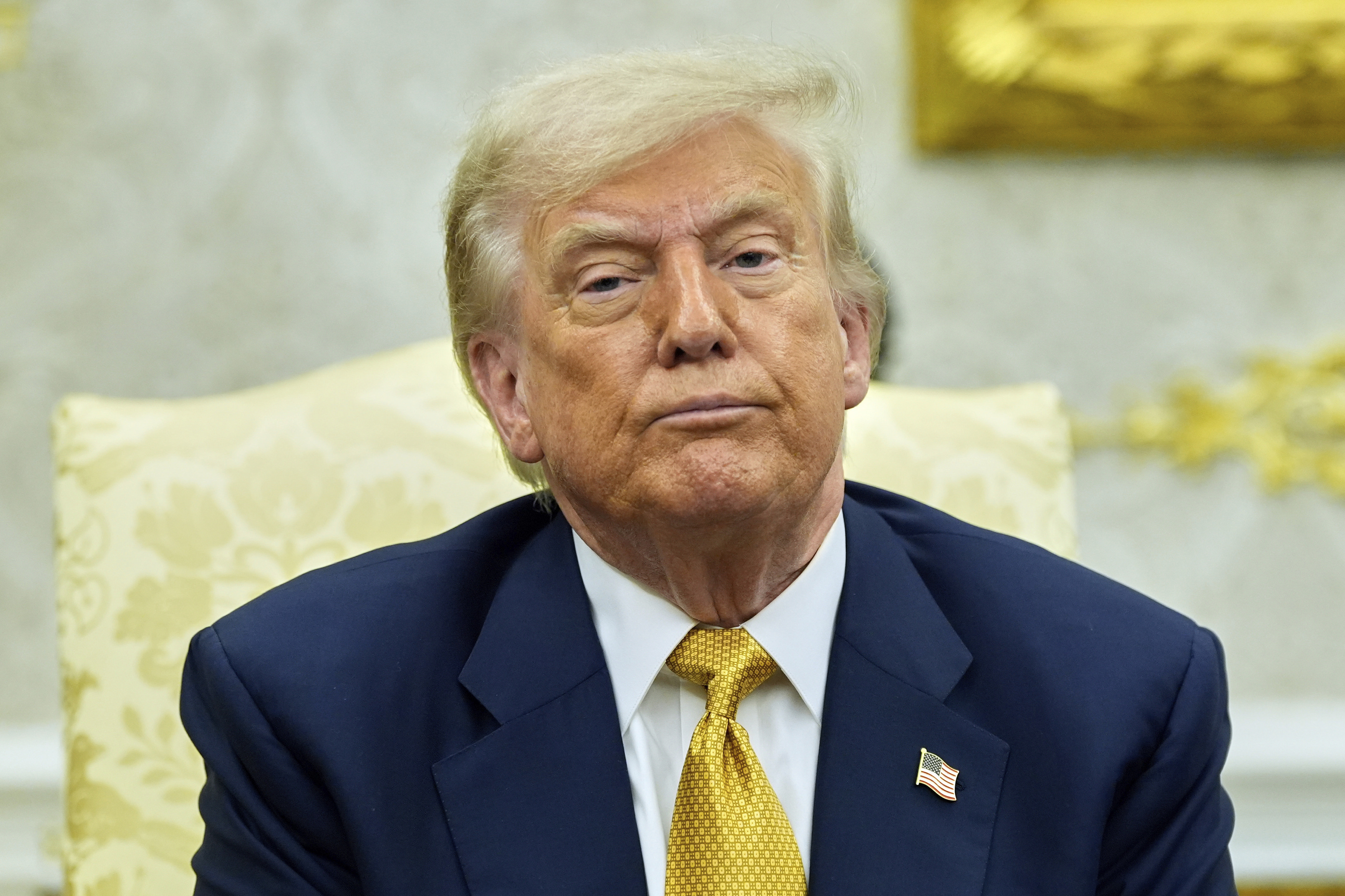 US President Donald Trump listens during a meeting with Bahrain's Crown Prince Salman bin Hamad Al Khalifa in the Oval Office of the White House.
