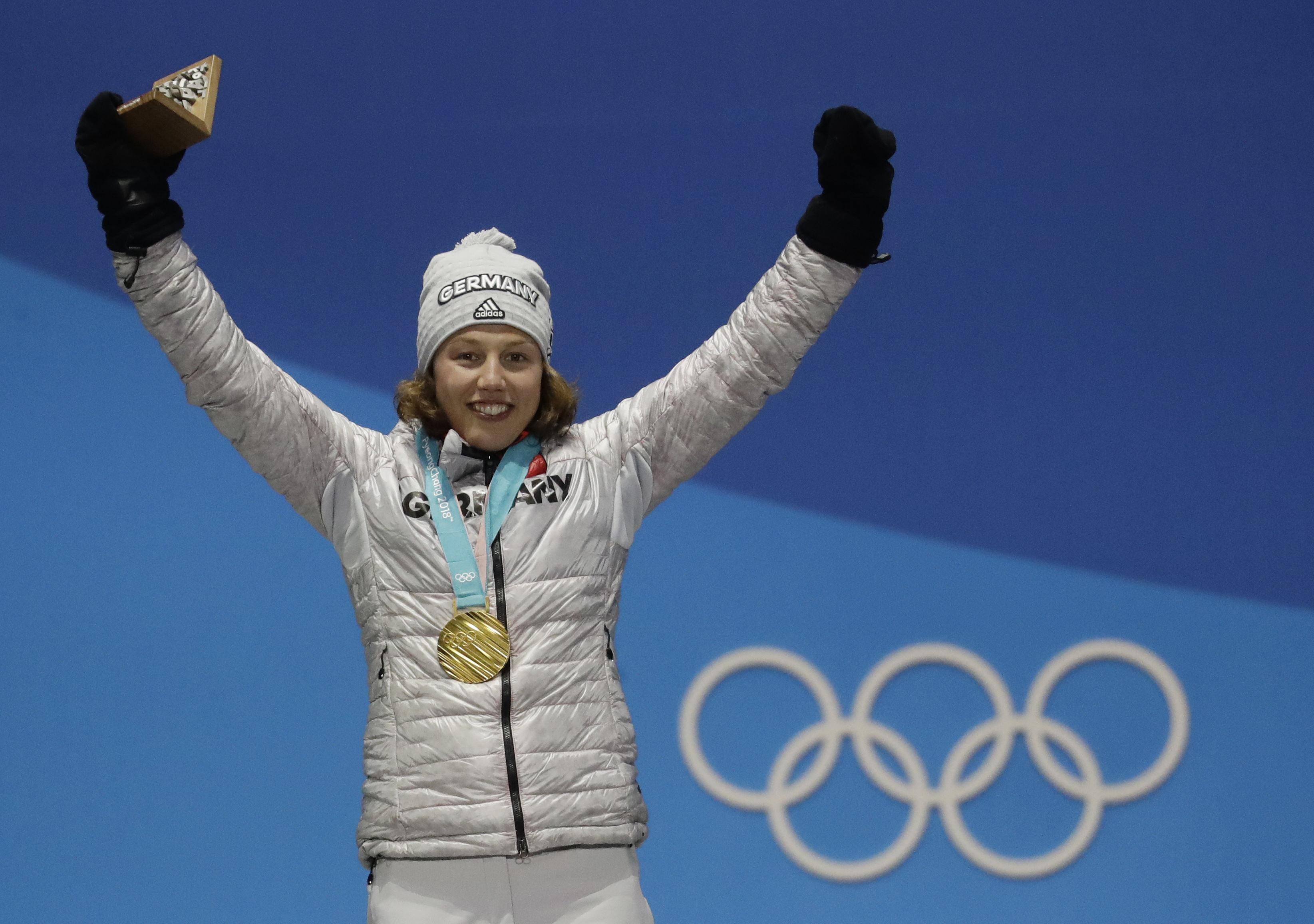 Women's 7.5km biathlon sprint gold medalist Laura Dahlmeier, of Germany, celebrates during the medals ceremony at the 2018 Winter Olympics in Pyeongchang, South Korea