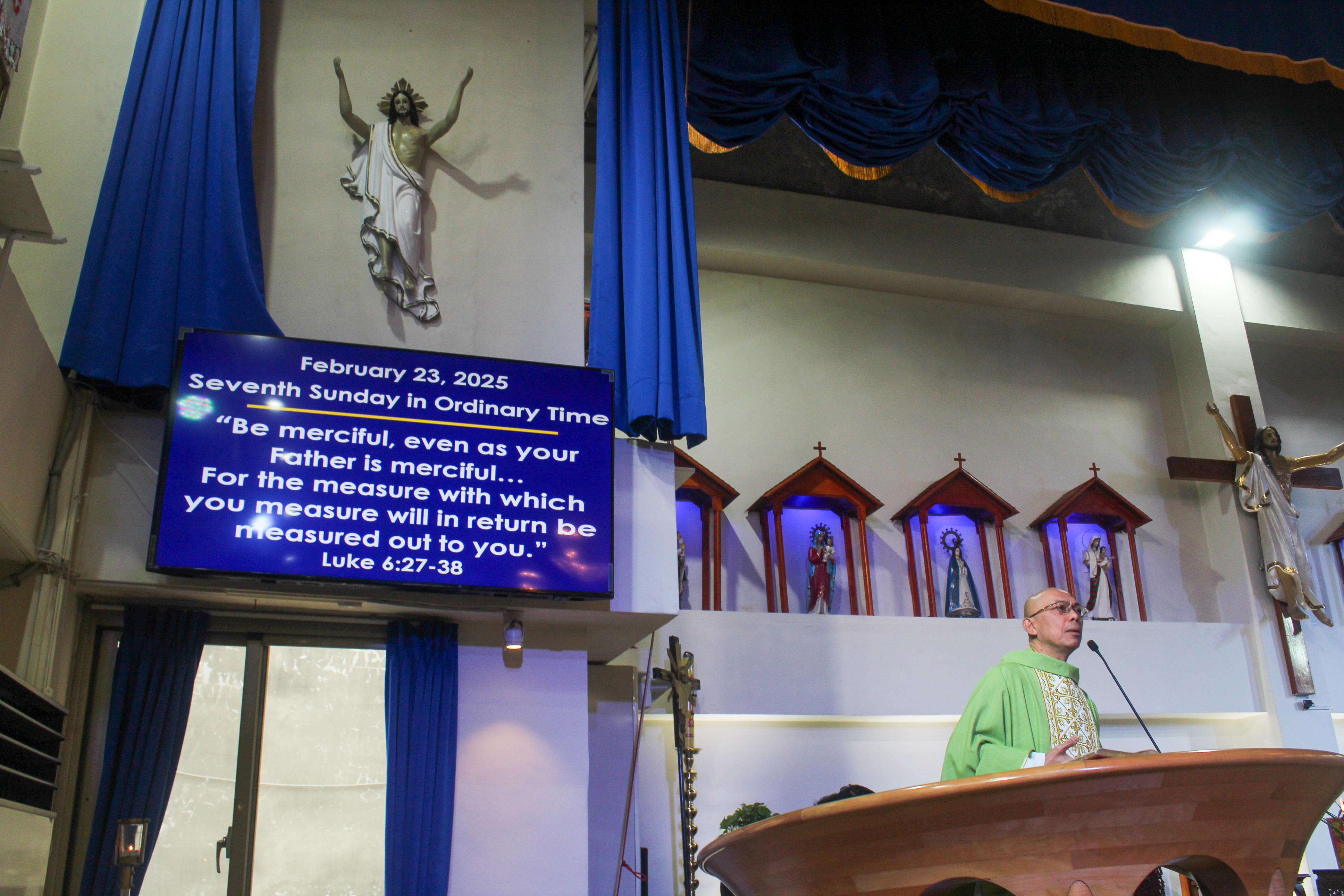 Joy Tajonera celebrates Sunday Mass at Taichung Catholic Church in Taichung, Taiwan, on May 23, 2025 [ Michael Beltran/Al Jazeera]