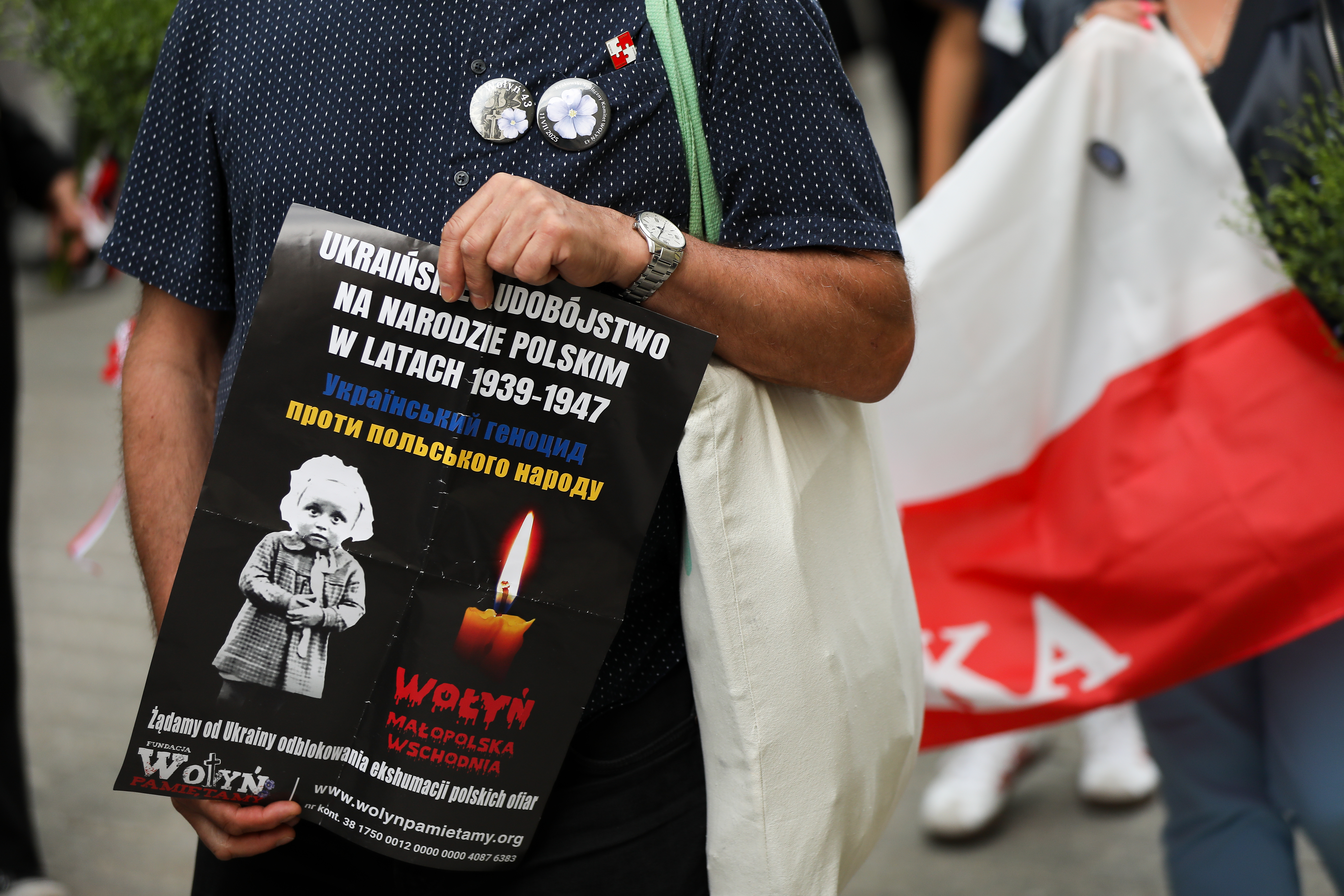 Participants of the 3rd Black March of Wolyn 1943 walk through the city streets.