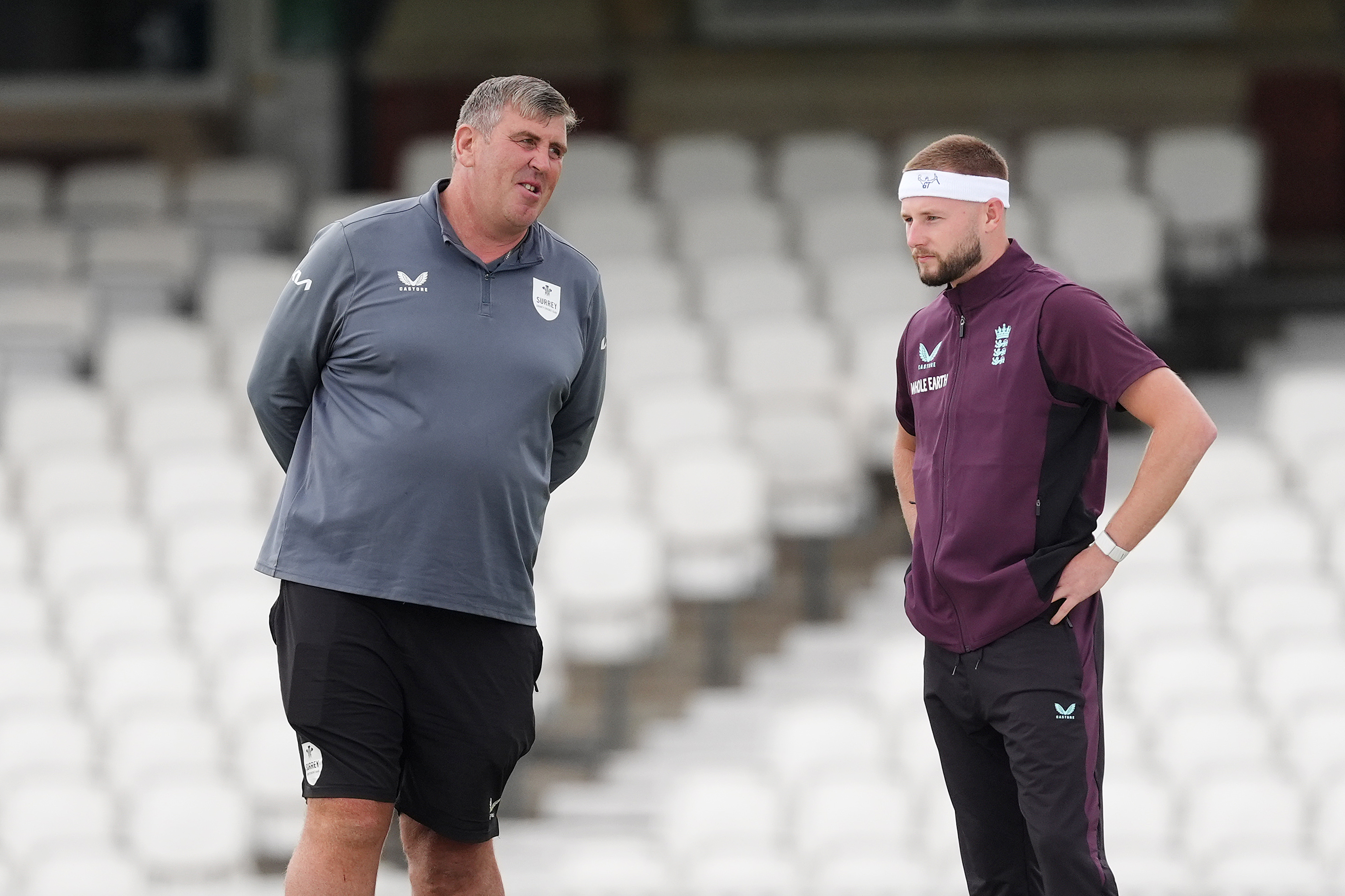 England's Gus Atkinson with Oval head groundsman Lee Fortis (left) during a nets session at the Kia Oval, London
