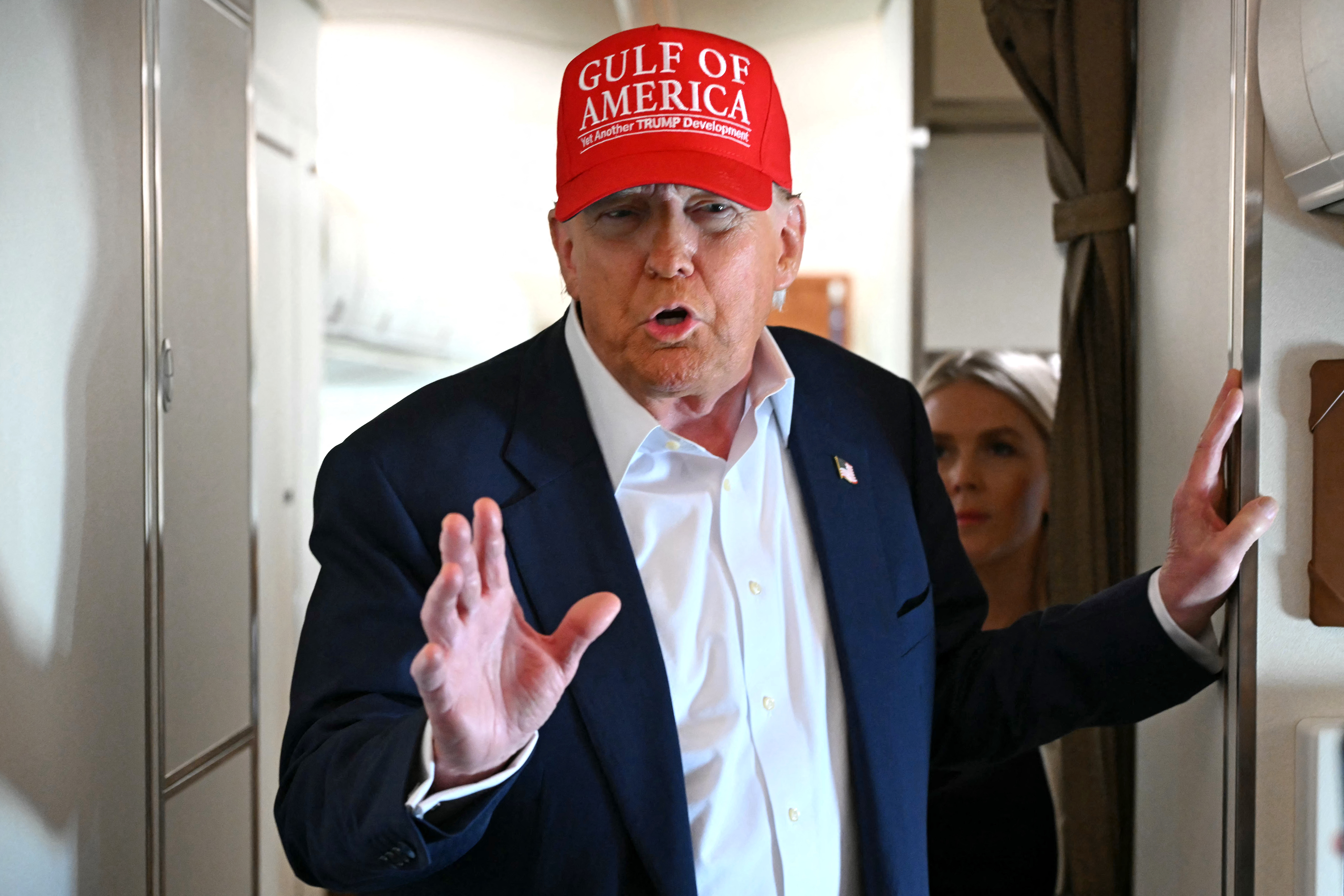 US President Donald Trump speaks with the press on board Air Force One as he travels from Ochopee, Florida to Joint Base Andrews, Maryland on July 1, 2025.