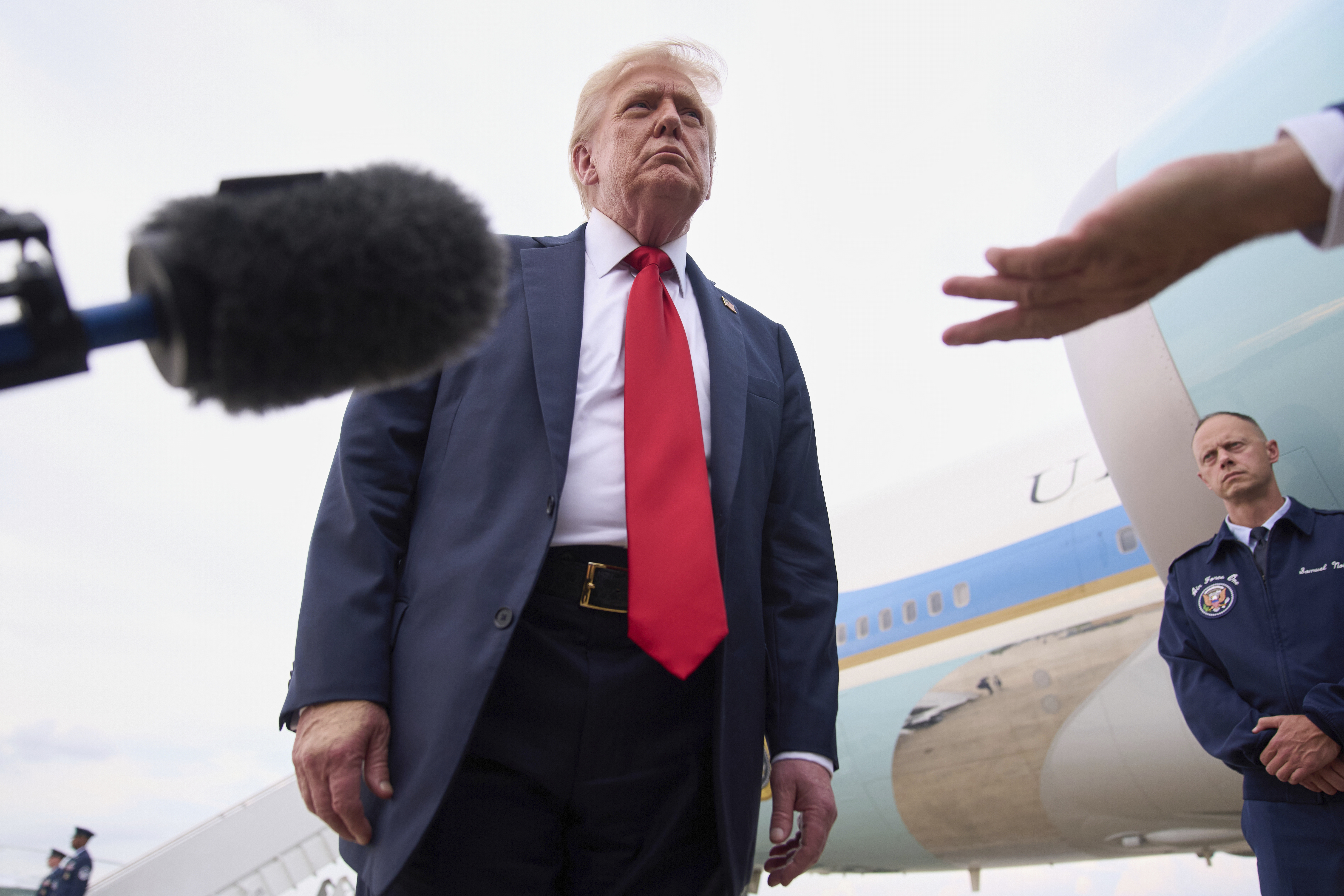 President Donald Trump speaks to the media, Sunday, July 13, 2025, on arrival to Joint Base Andrews, Md., en route to Washington, after attending the Club World Cup final soccer match in New Jersey. (AP Photo/Jacquelyn Martin)