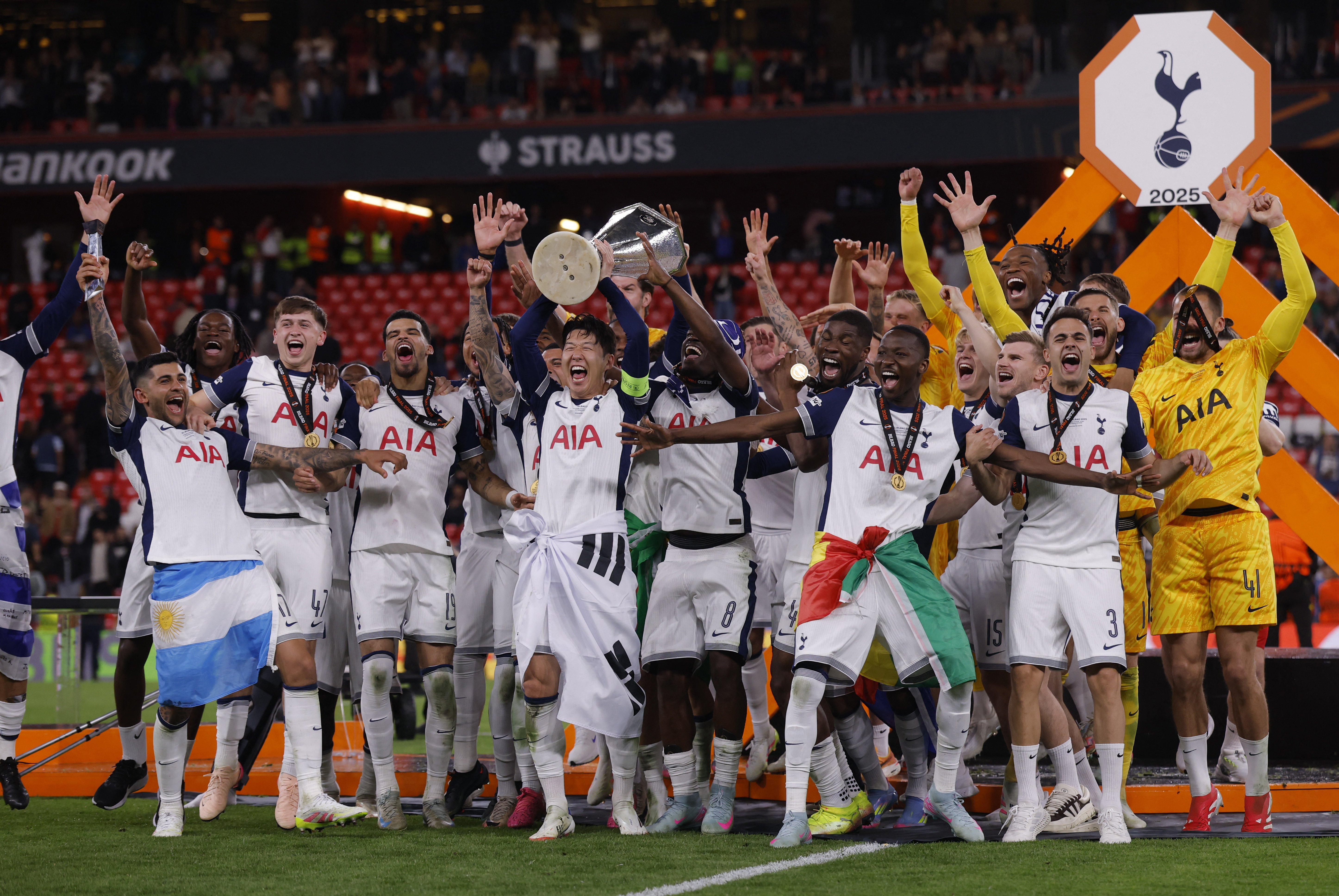 Tottenham Hotspur's captain, Son Heung-min, lifts the trophy with teammates after winning the Europa League Final