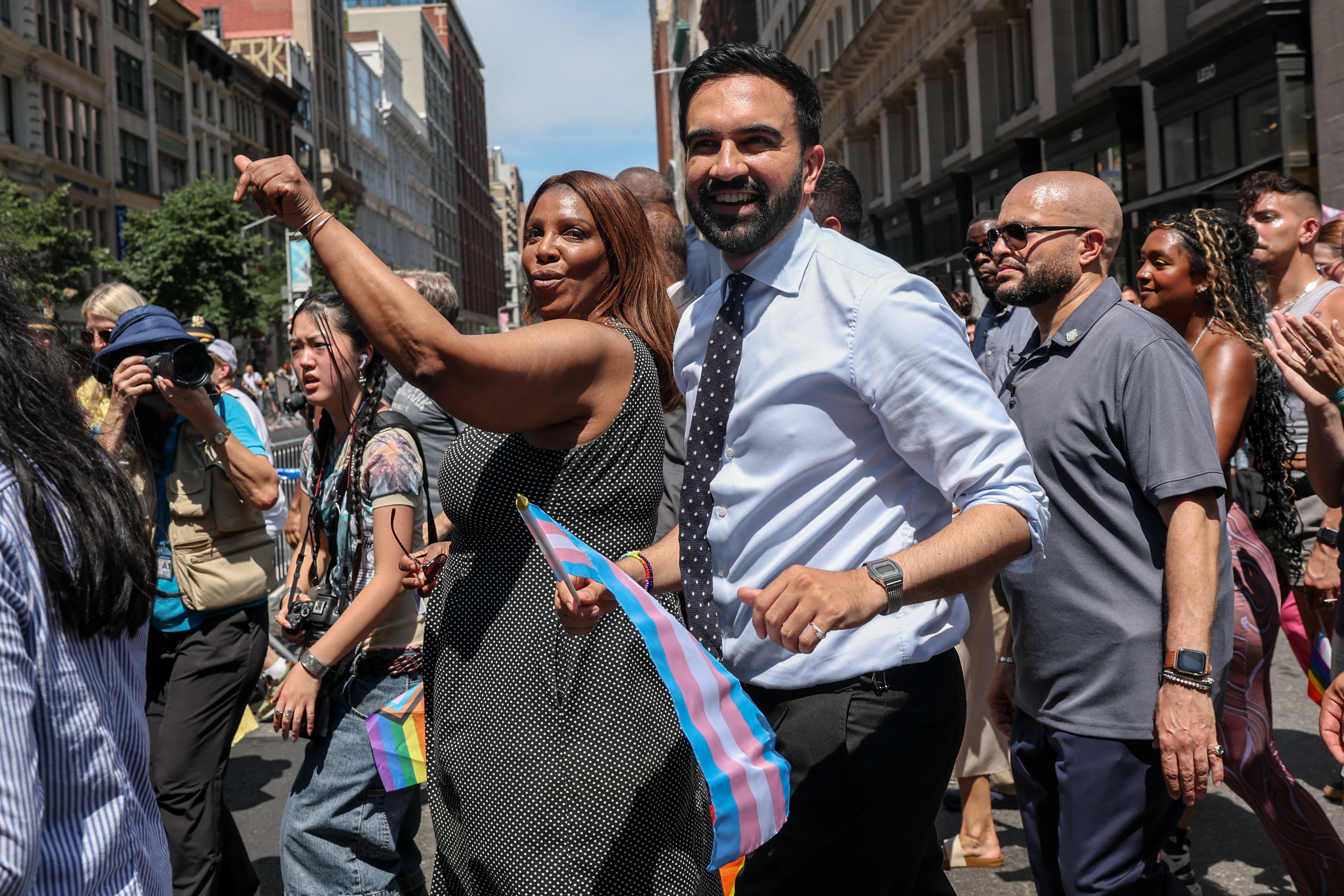 Zohran Mamdani and Letitia James march in a New York City pride parade