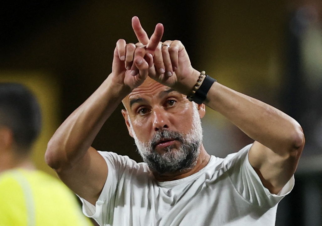 Manchester City manager Pep Guardiola reacts at full time before extra time at the Club World Cup