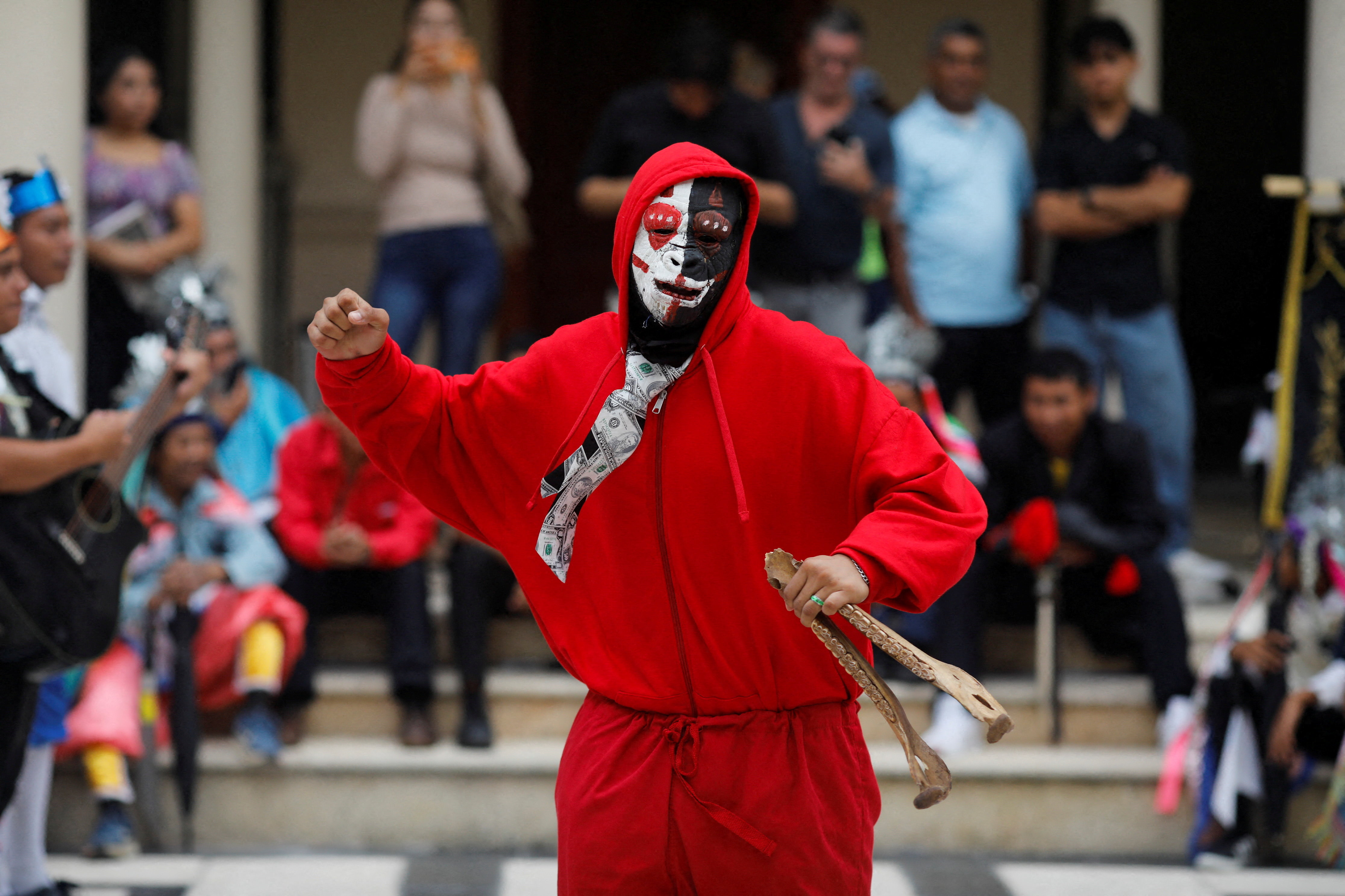 A traditional dancer takes part in a festival to mark the International Day