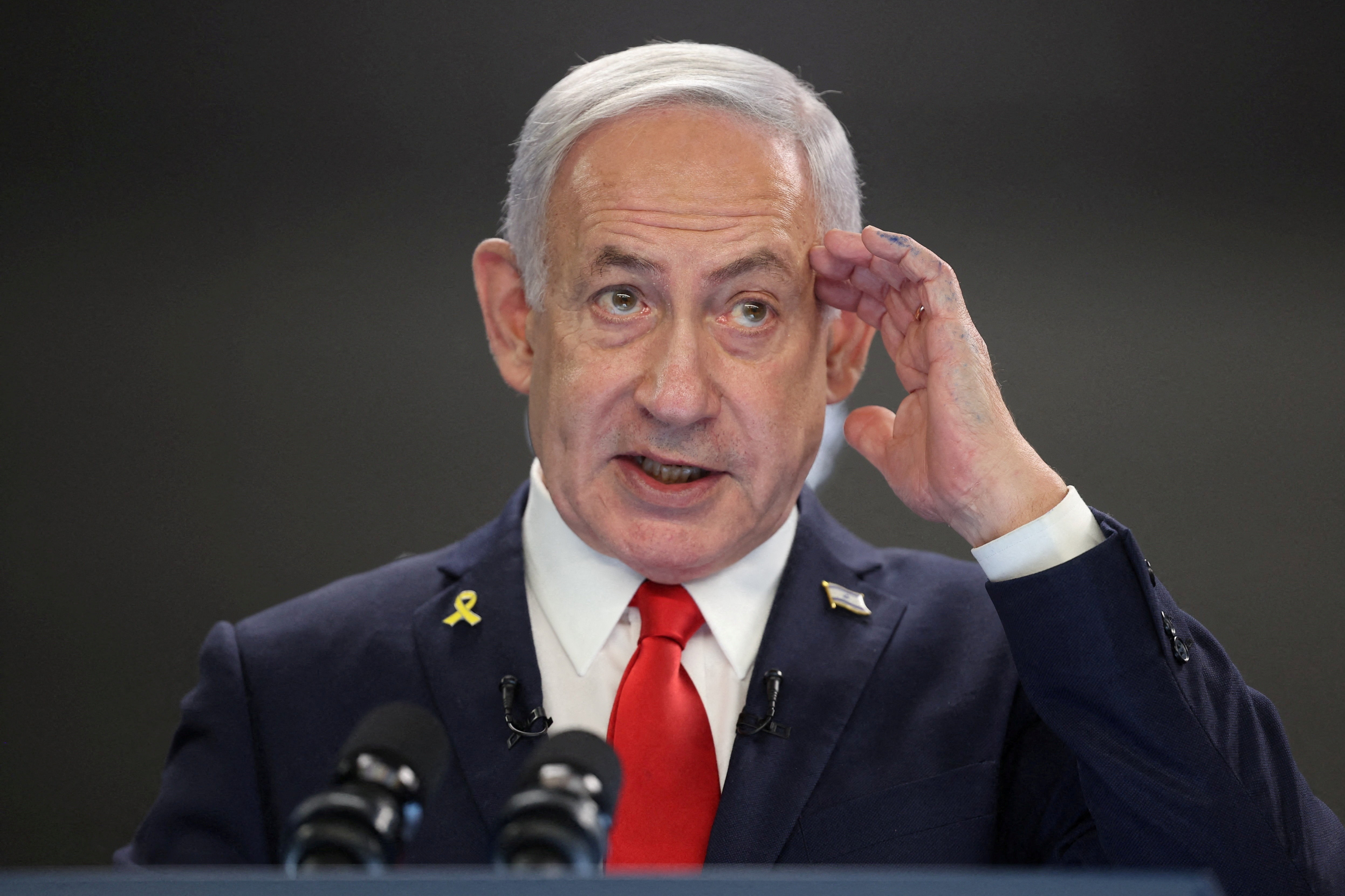 Israeli Prime Minister Benjamin Netanyahu speaks during a news conference.
