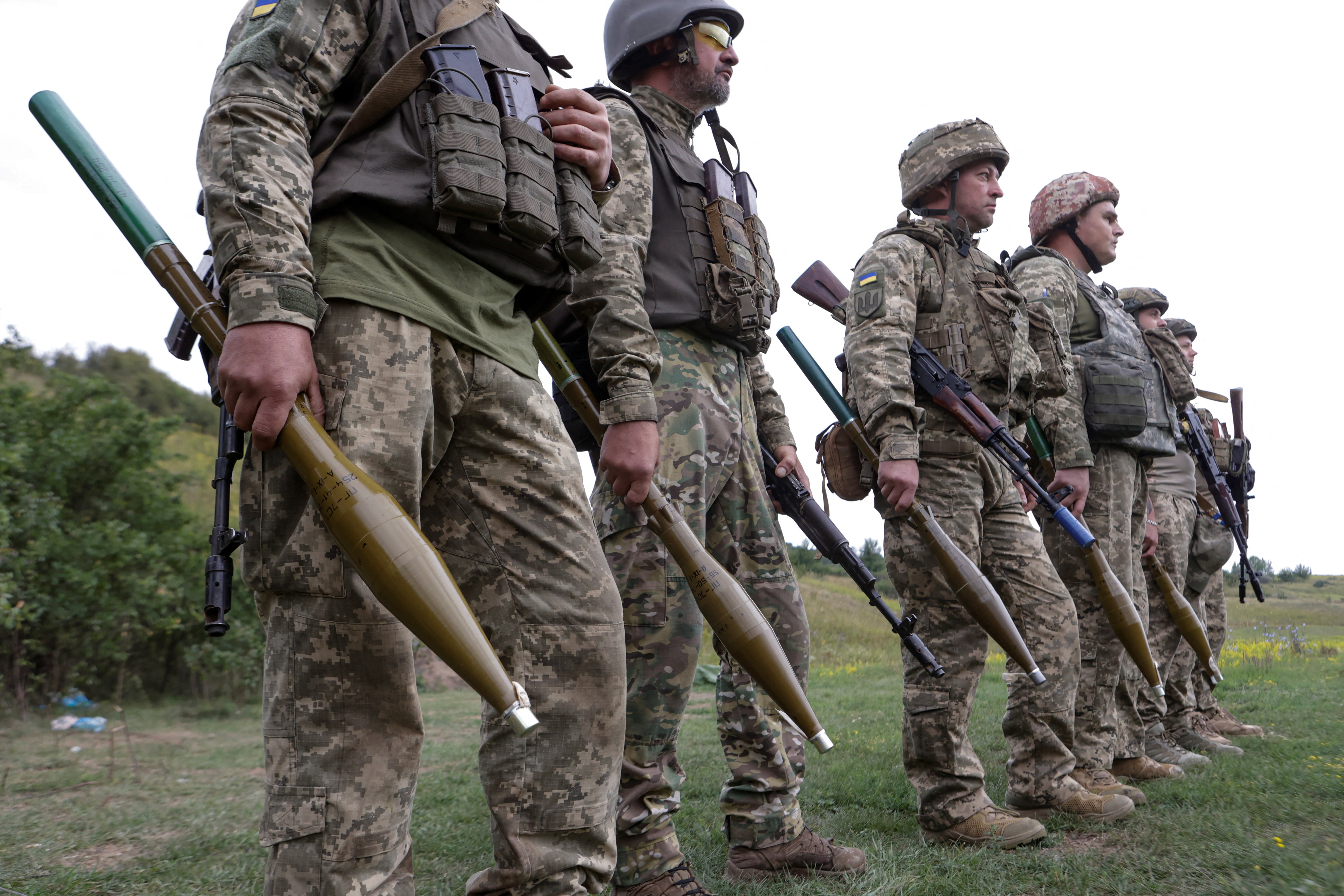 Service members of the 58th Separate Motorized Infantry Brigade of the Ukrainian Armed Forces attend military exercises at a training ground, amid Russia's attack on Ukraine, in Kharkiv region, Ukraine August 11, 2025. REUTERS/Sofiia Gatilova